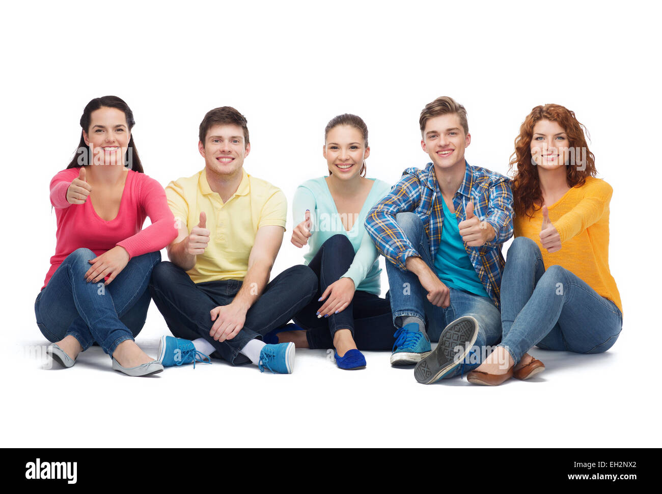 Groupe d'adolescents souriants showing Thumbs up Banque D'Images