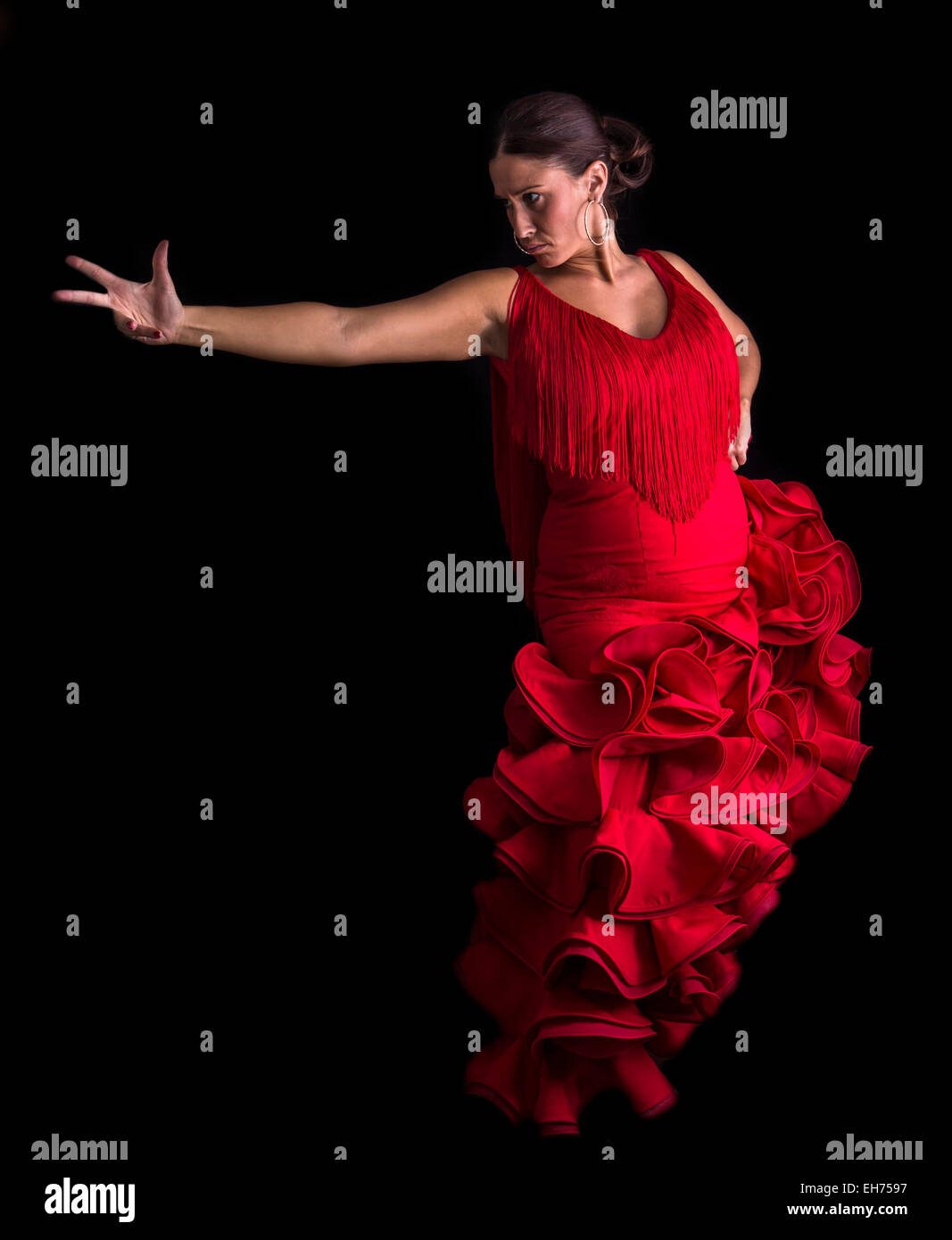 Danseuse De Flamenco Robe Rouge Dos Et Mains Croisees Sur Fond Noir Photo Stock Alamy