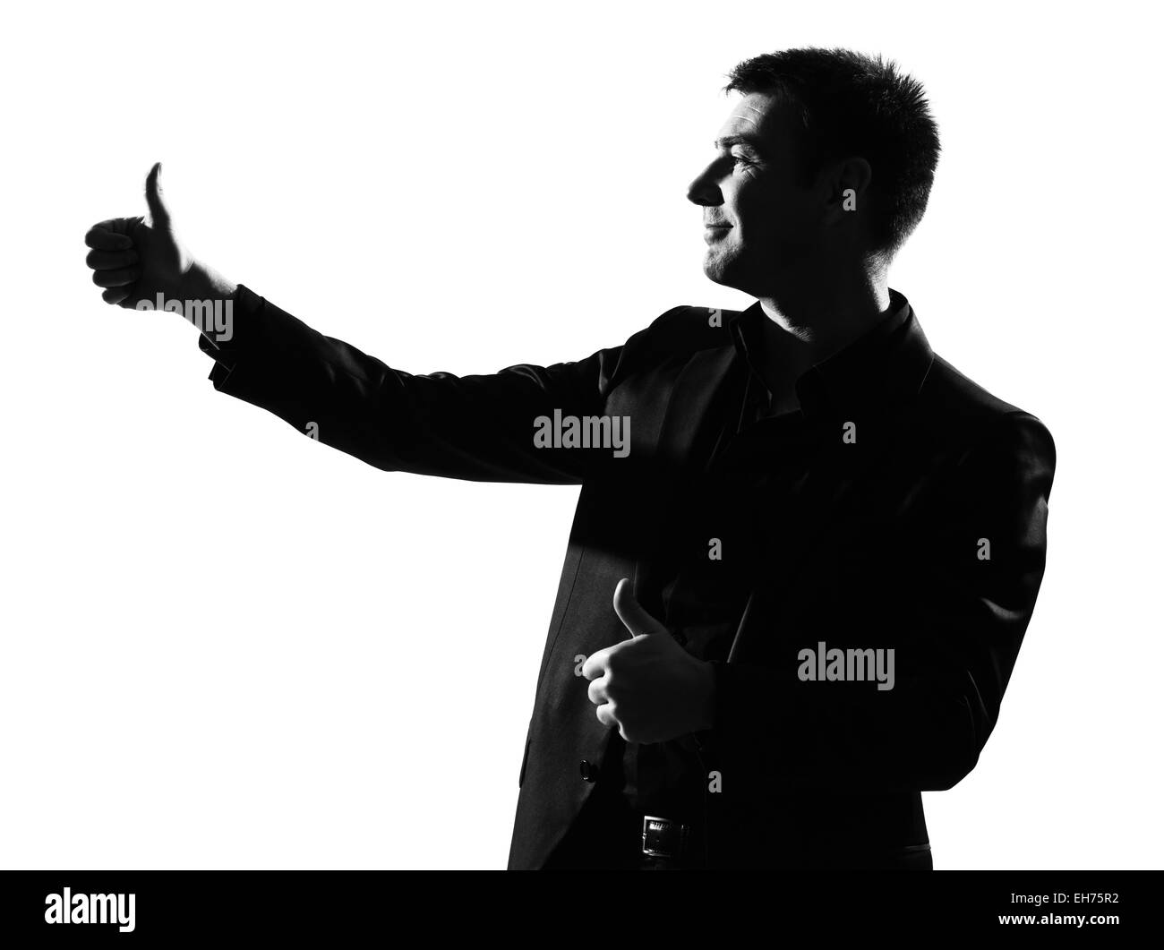 Silhouette caucasian business man Thumbs up exprimant un comportement gagnant sur toute la longueur isolée studio fond blanc Banque D'Images
