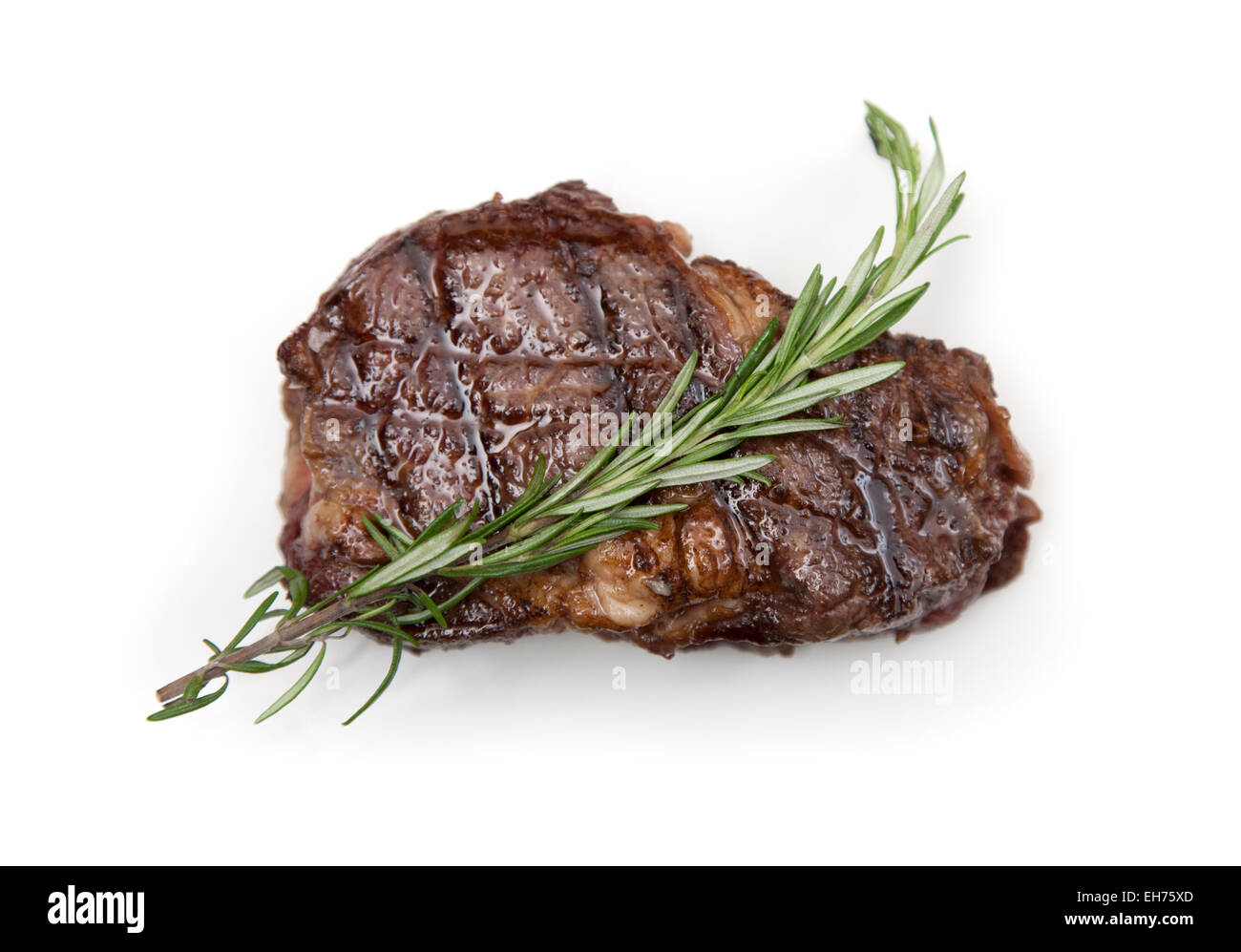 Ribeye steak juteux sur fond blanc Banque D'Images