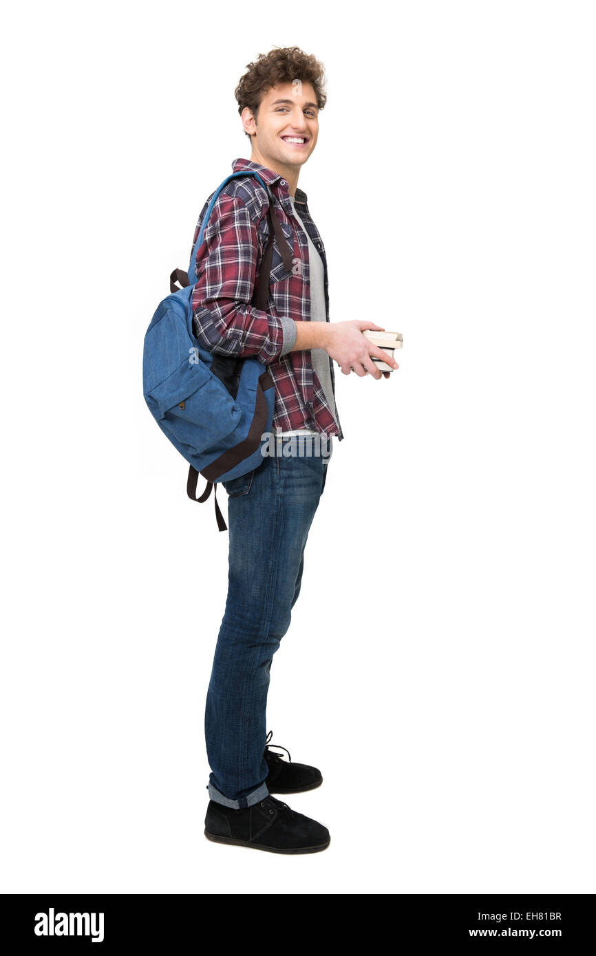 Portrait of a happy male student over white background Banque D'Images