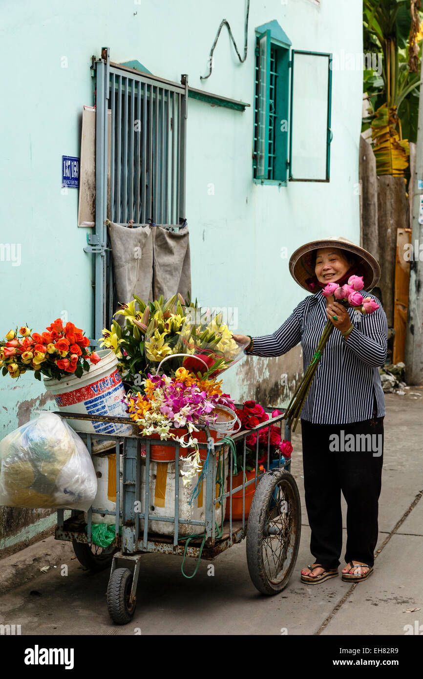 Marchande de fleurs, Can Tho, Delta du Mékong, au Vietnam, en Indochine, en Asie du Sud-Est, l'Asie Banque D'Images