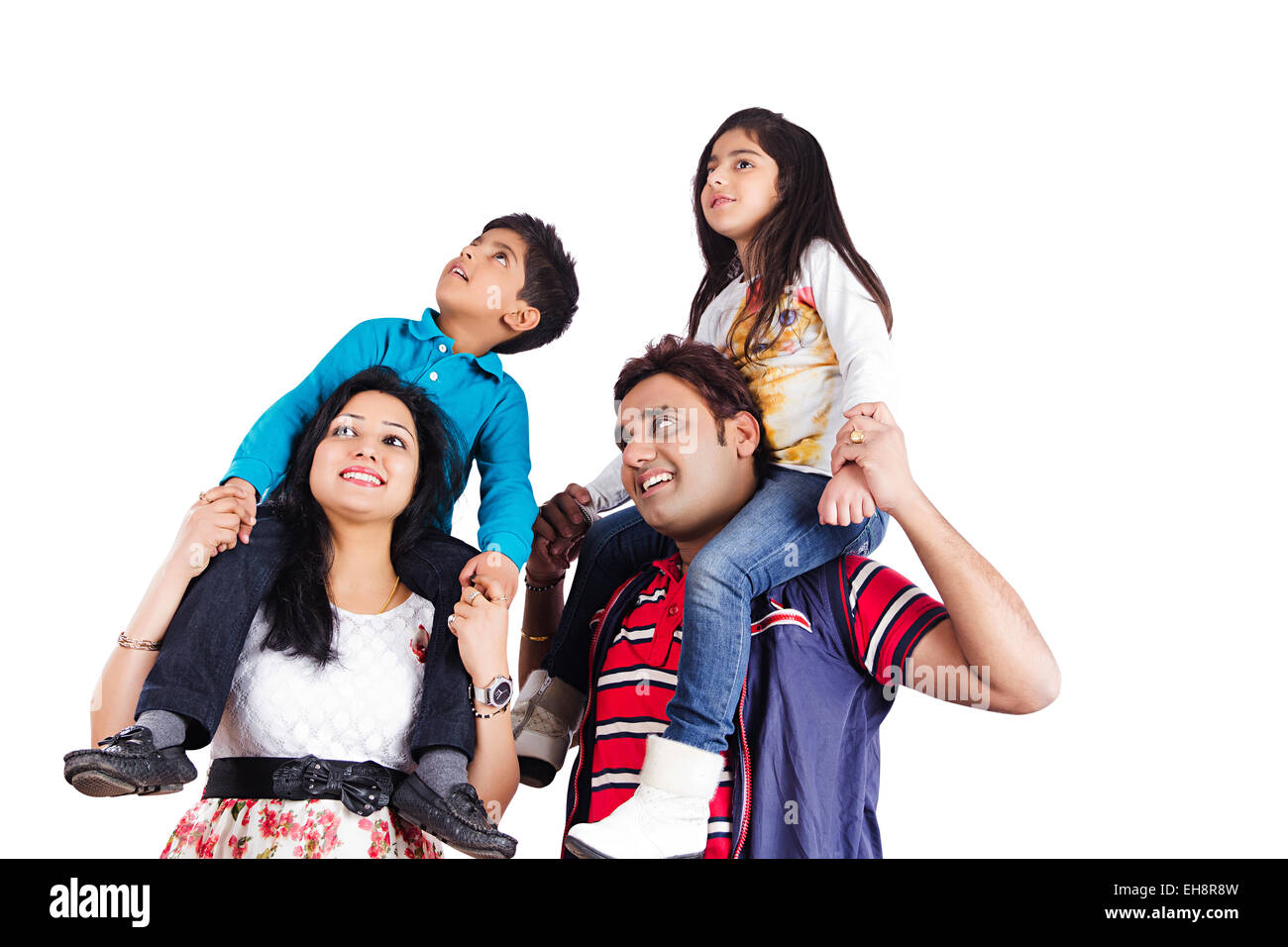 4 Les parents et les enfants indiens jouissent permanent Banque D'Images