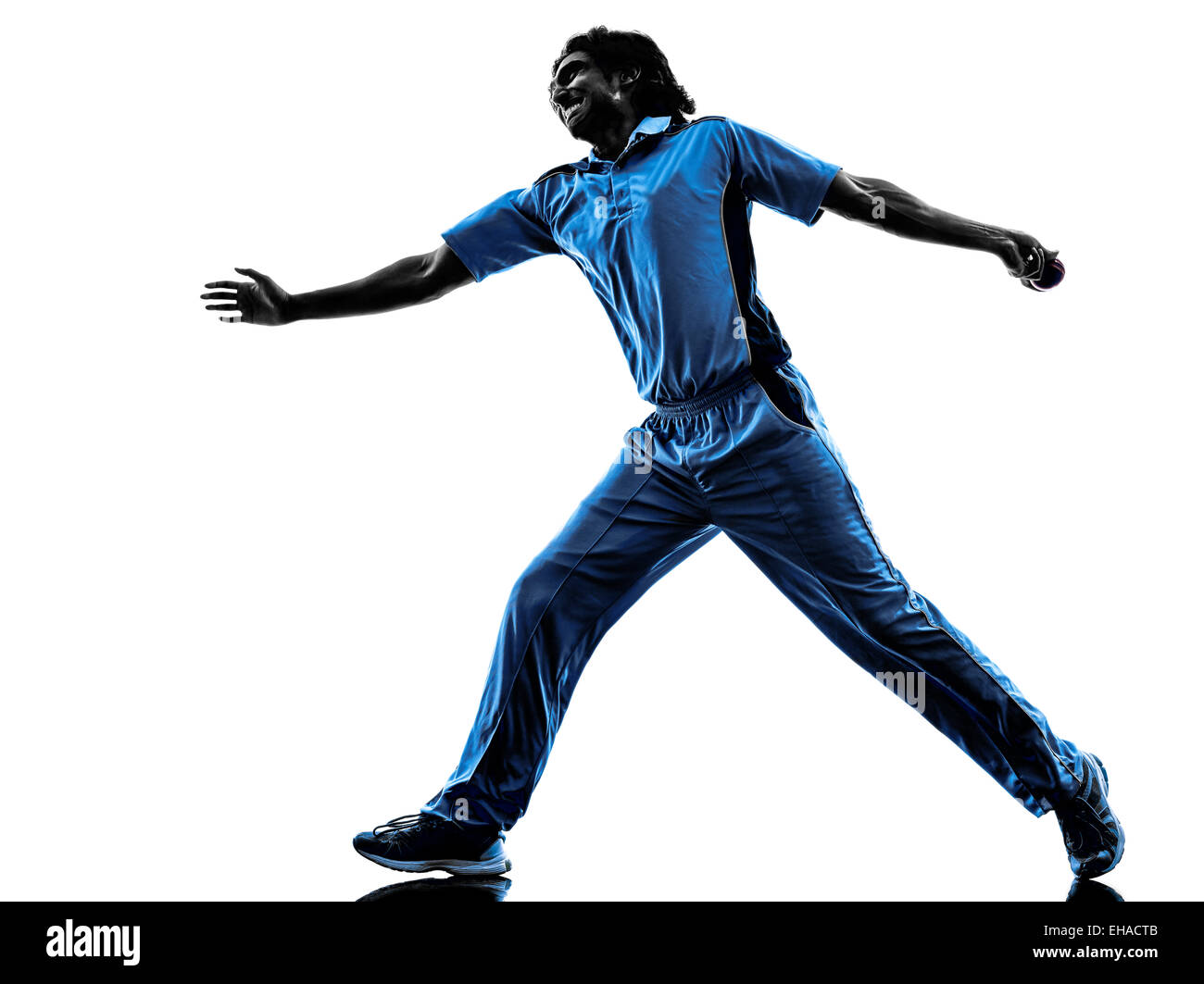 Joueur de Cricket pitcher en silhouette ombre sur fond blanc Banque D'Images