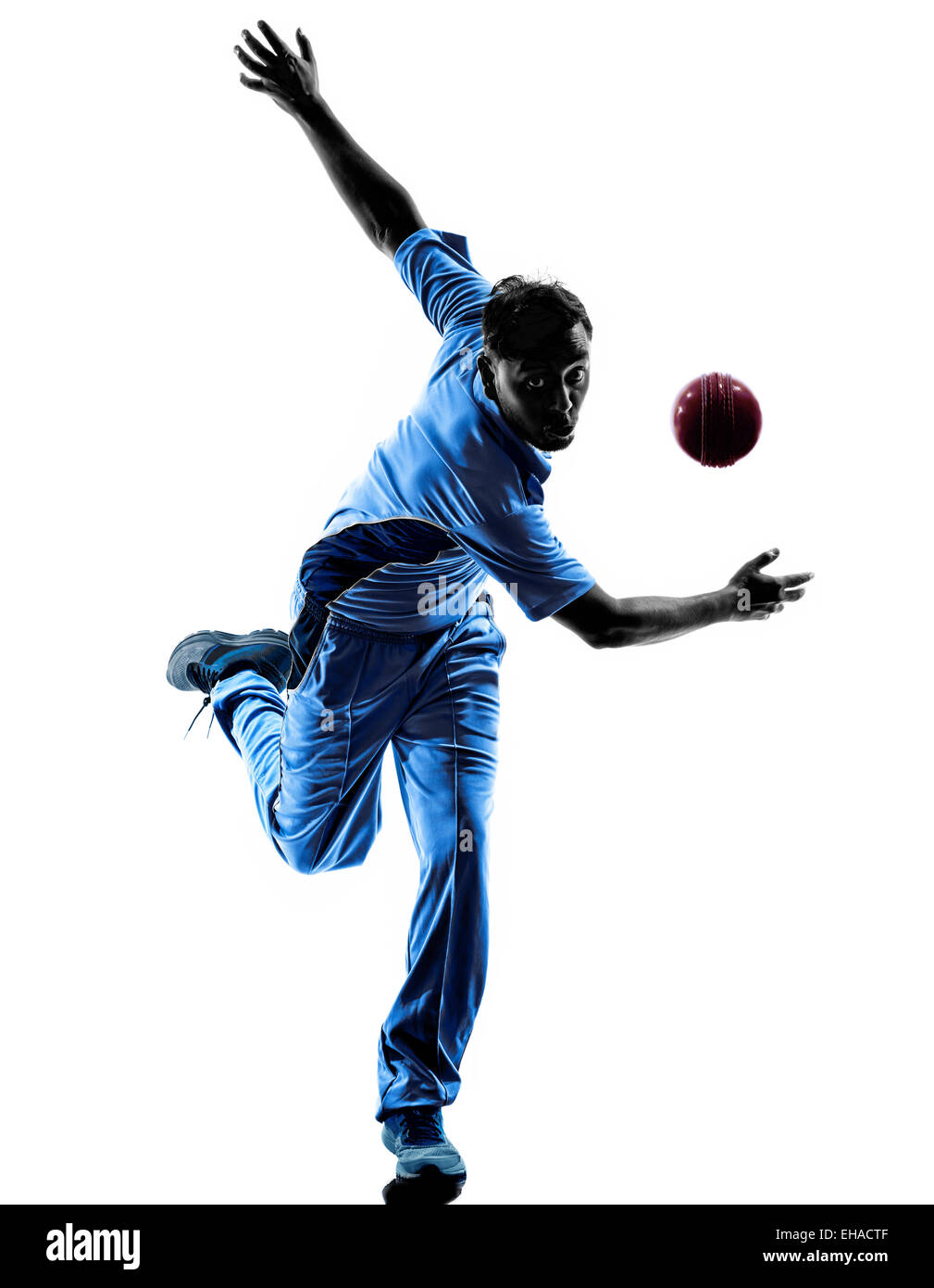 Joueur de Cricket pitcher en silhouette ombre sur fond blanc Banque D'Images