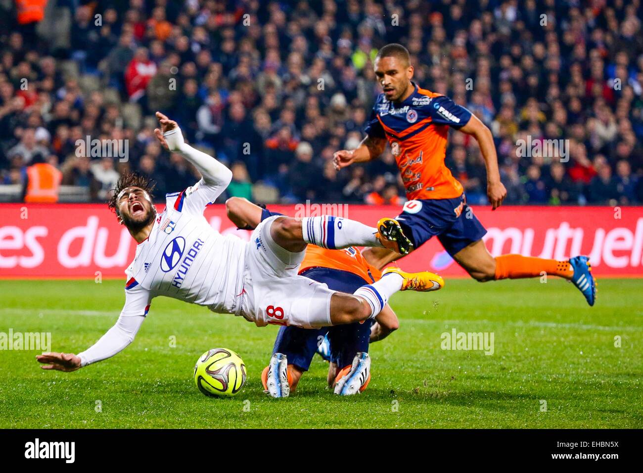 Nabil Fekir/Faute de Abdelhamid El Kaoutari - 08.03.2015 - Montpellier/Lyon - 28ème journée de Ligue 1 .Photo : André Delon/Icon Sport. *** Légende locale Banque D'Images