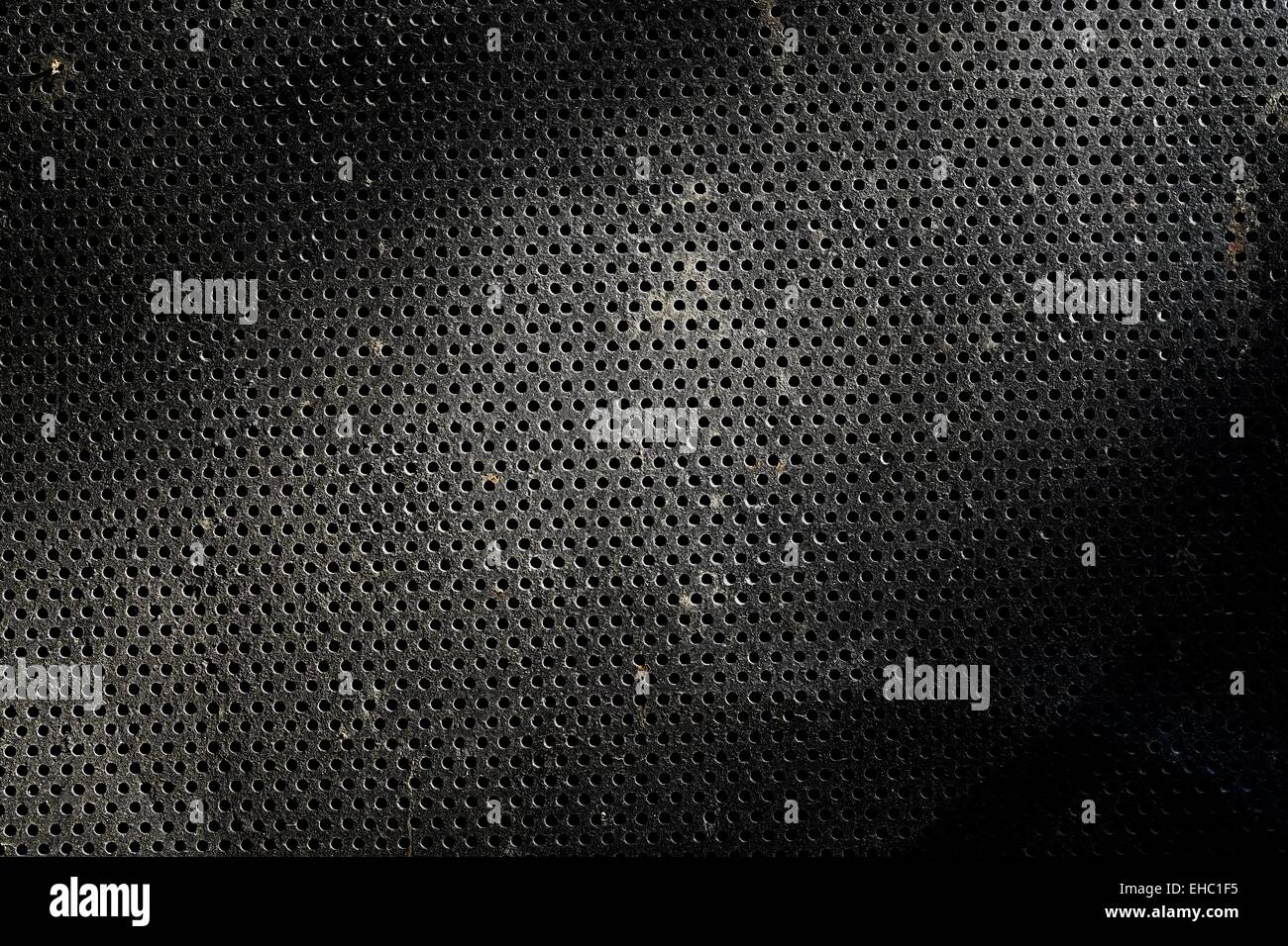 La texture de métal avec trous ronds motif nid d Banque D'Images