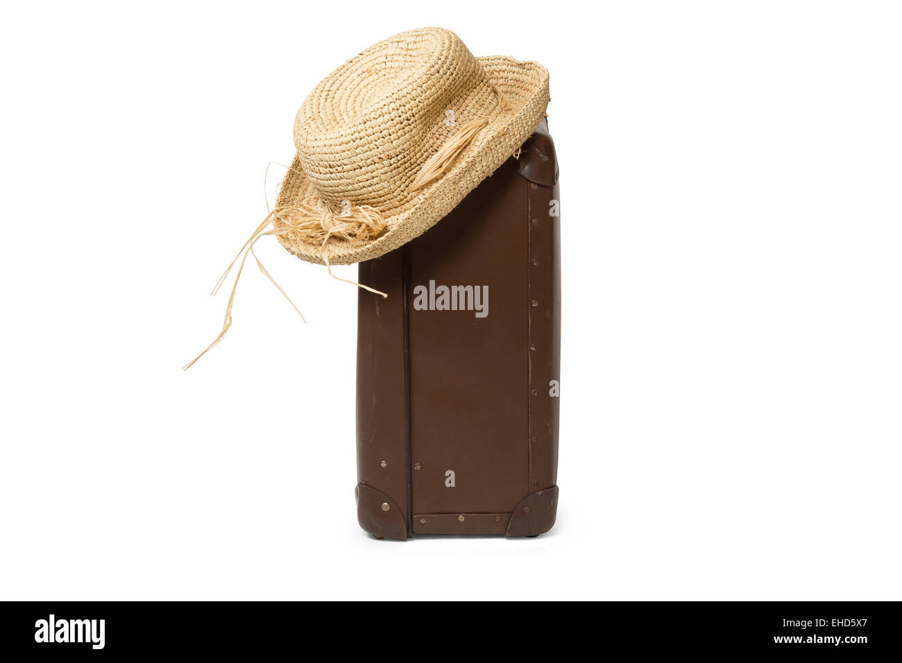 Valise avec de vieux chapeau de paille Banque D'Images