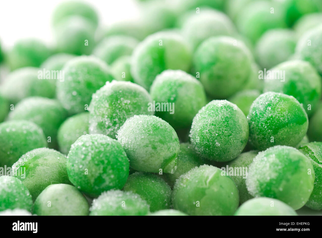 Pois verts congelés close up. Banque D'Images