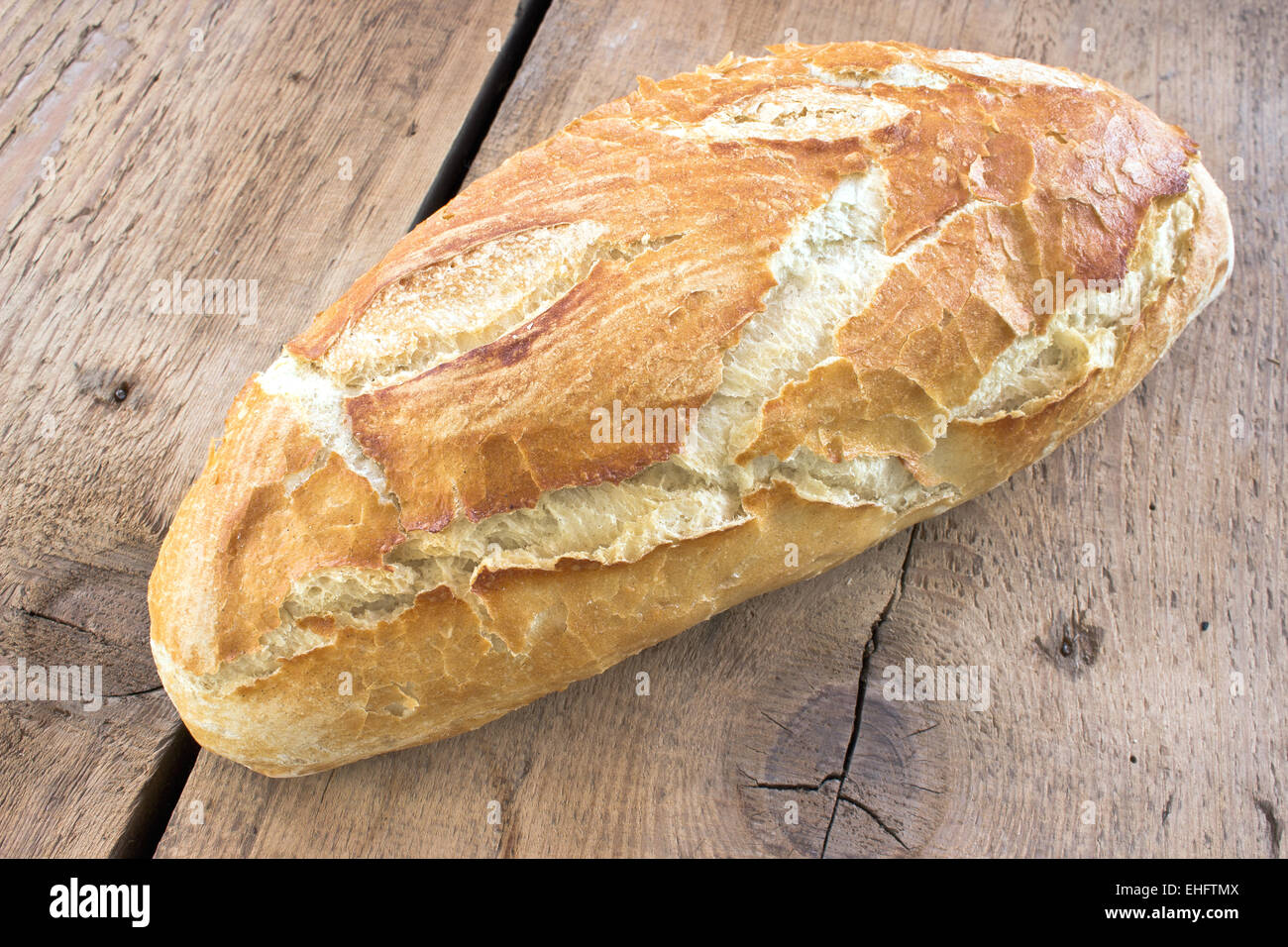 Du pain sur fond de bois Banque D'Images