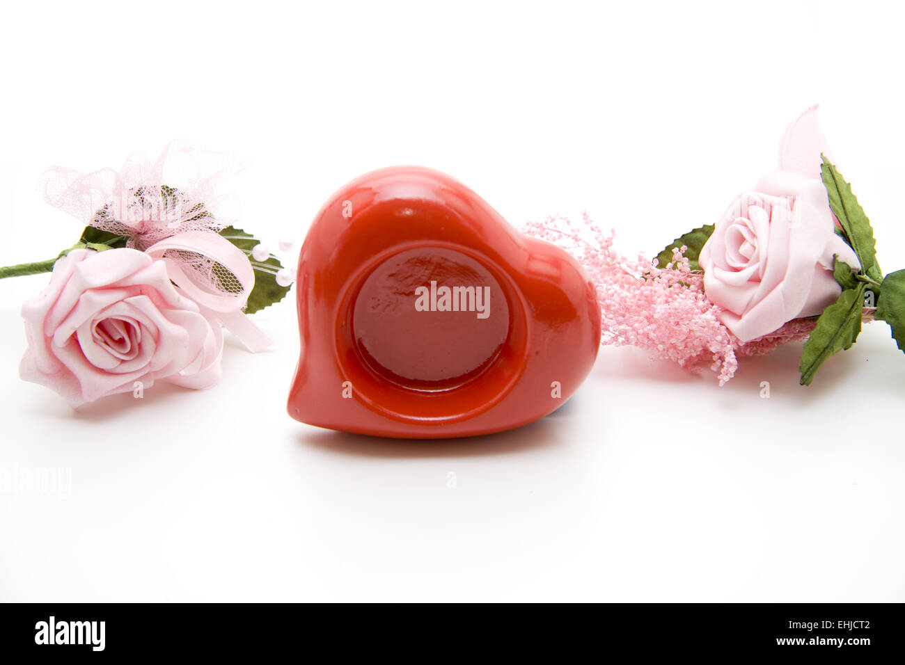 Coeur avec des roses rose Banque D'Images
