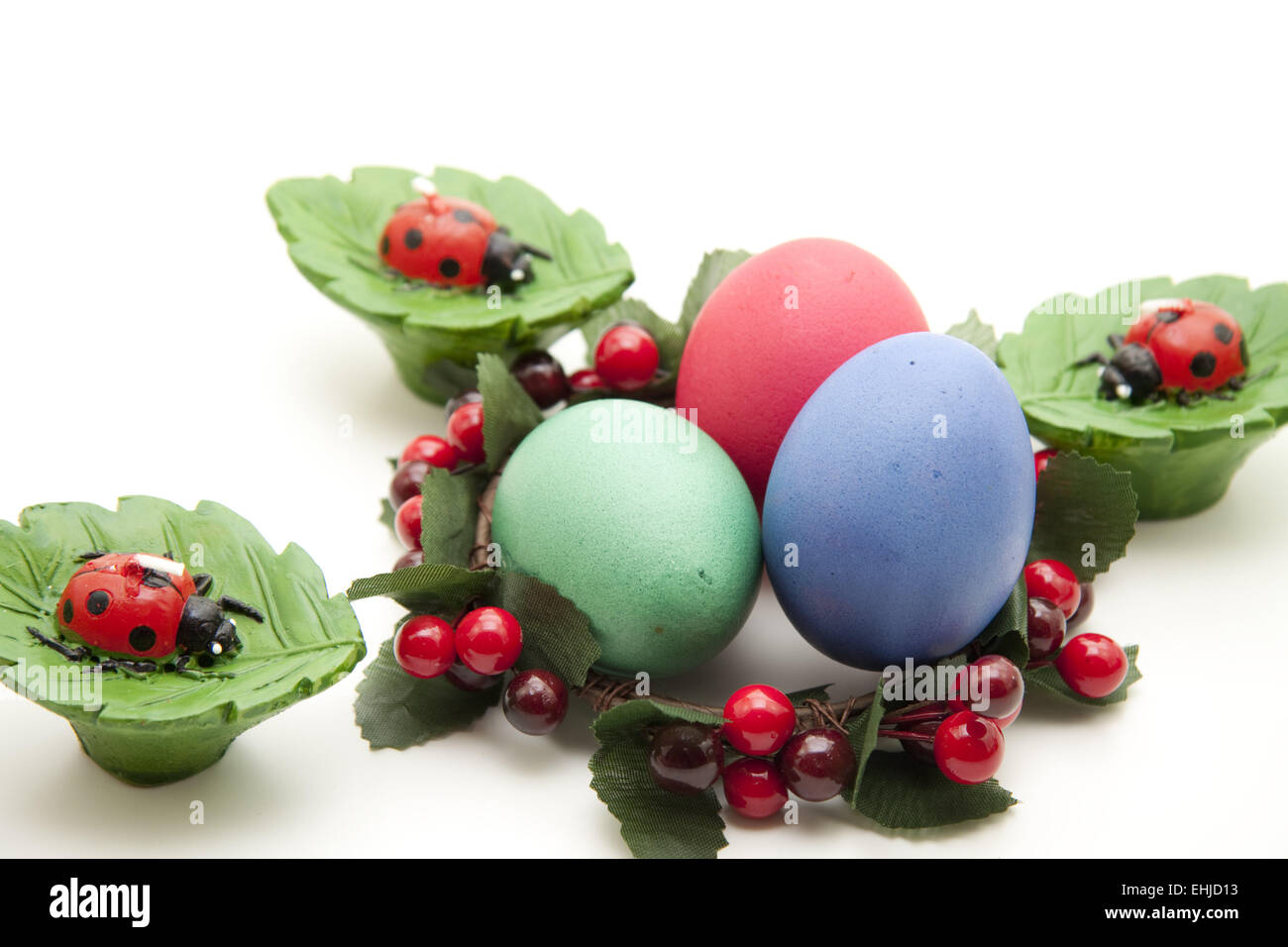 Les œufs de pâques avec coccinelle Banque D'Images