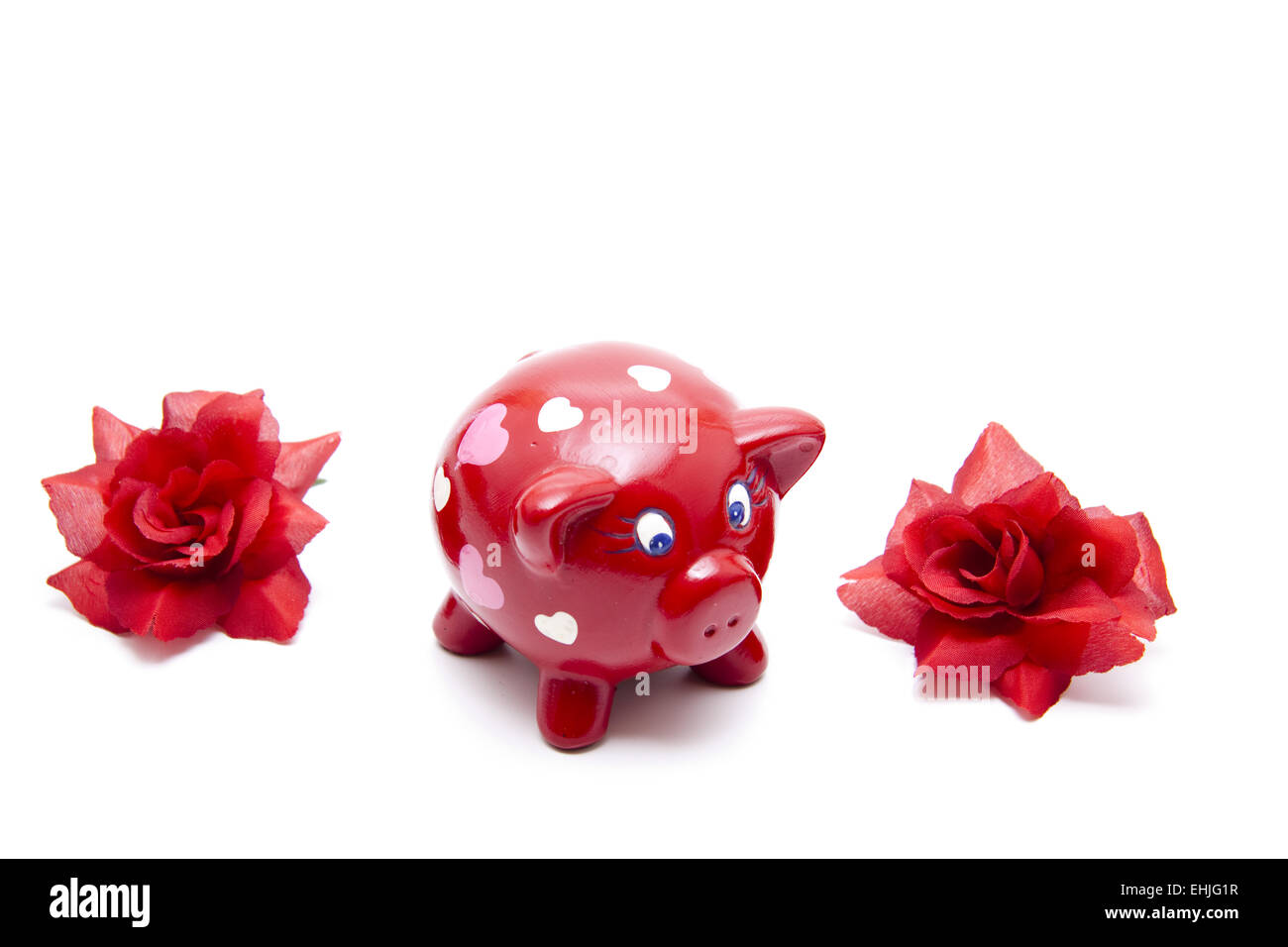 Tirelire avec fleurs rose Banque D'Images