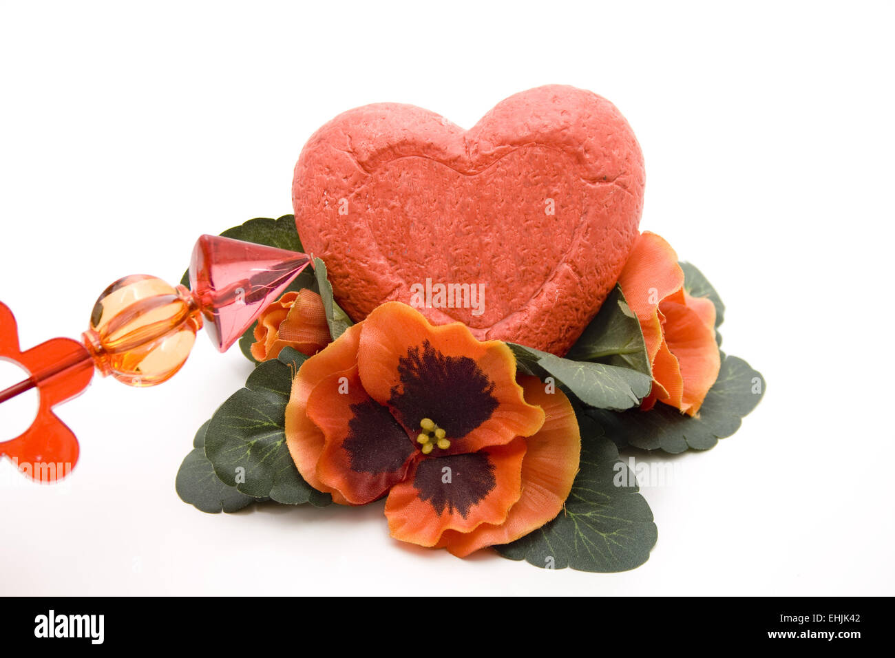 Coeur avec la flèche et de fleurs Banque D'Images