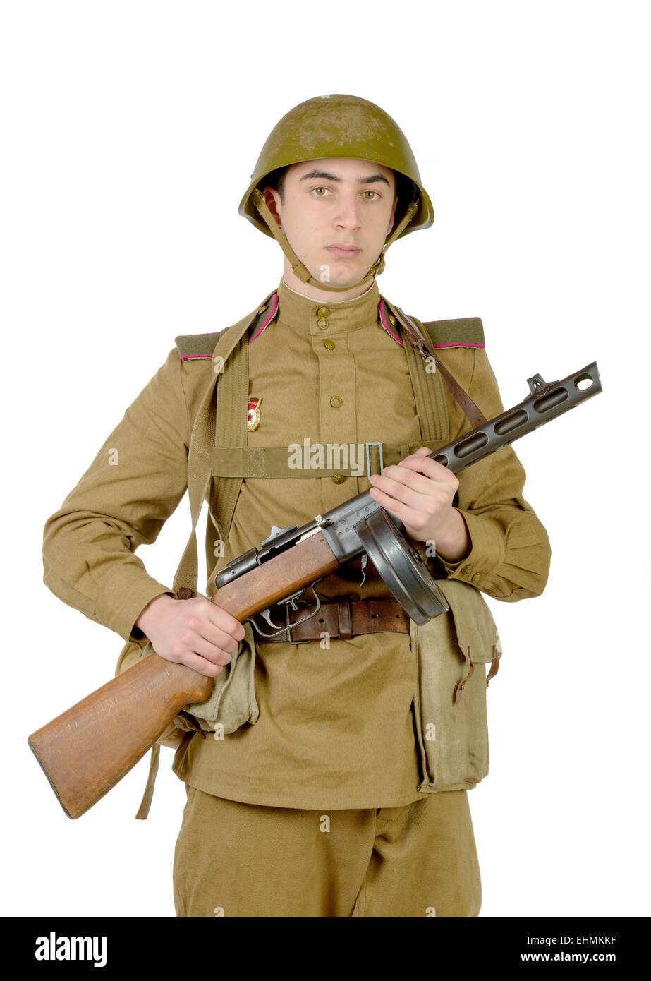 Jeune Soldat Sovi tique Avec Une Mitrailleuse Sur Le Fond Blanc Photo jeune-soldat-sovi-tique-avec-une-mitrailleuse-sur-le-fond-blanc-photo