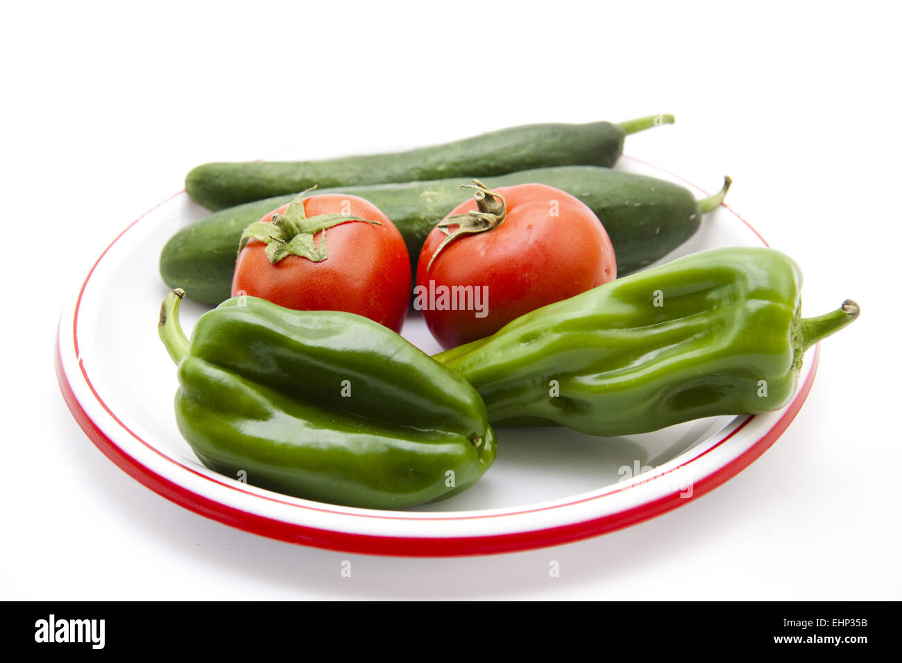 Tomates et concombres au paprika Banque D'Images