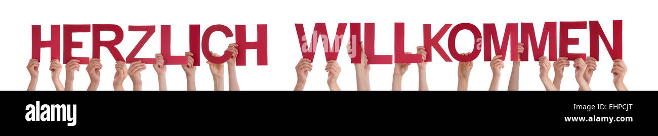 De nombreux peuples caucasiens et mains tenant droite rouge des lettres ou des caractères isolés L'édifice Mot allemand Herzlich Willkommen Banque D'Images