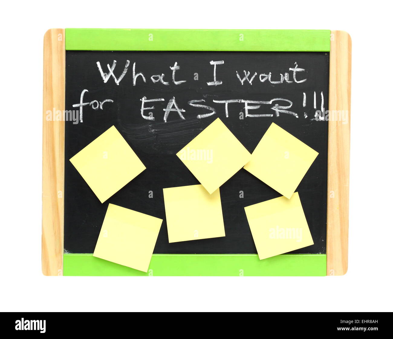 Concept de pâques avec voeux écrits avec craie blanche sur tableau noir Banque D'Images