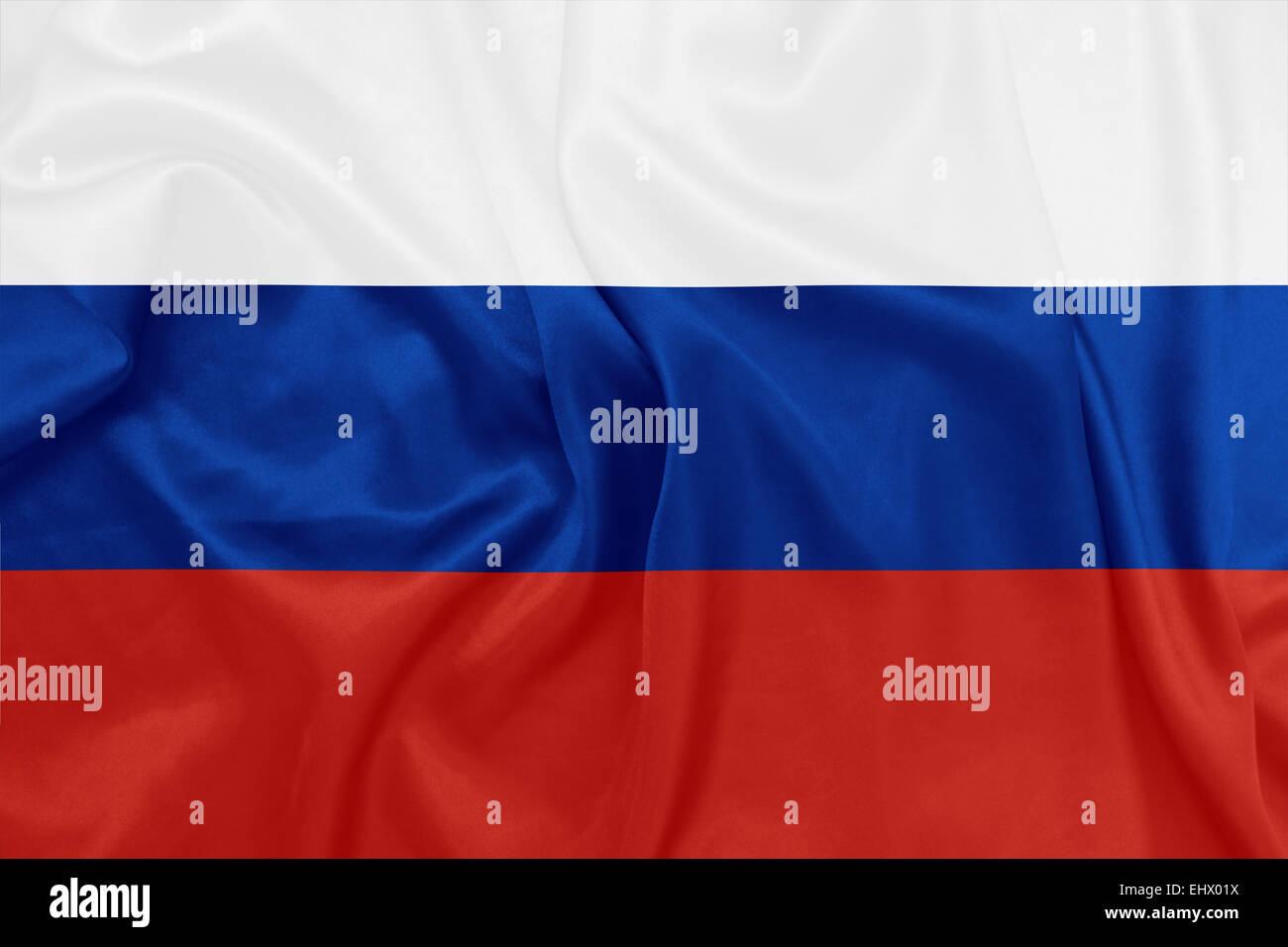 La Russie - en agitant le drapeau national sur la texture de la soie Banque D'Images