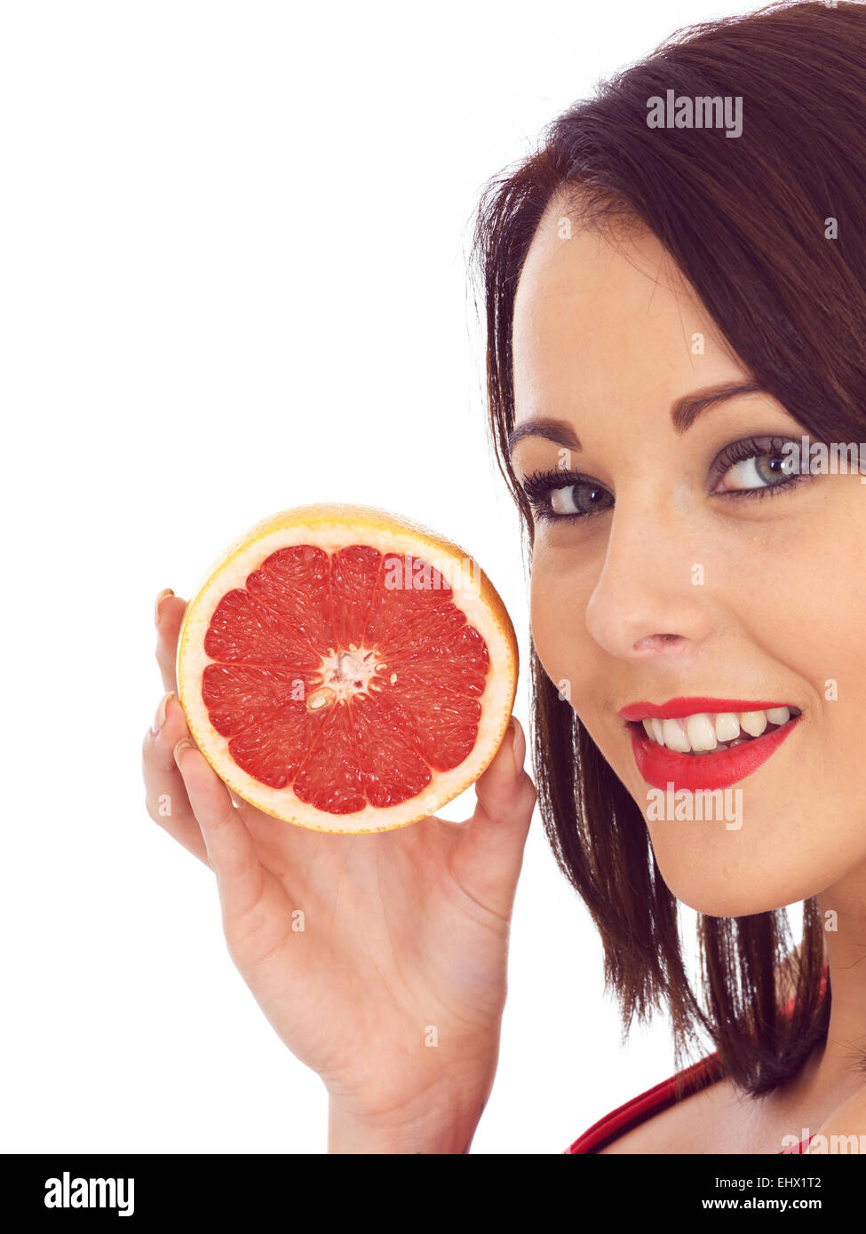 Attractive young woman eating indian Snack food Banque D'Images