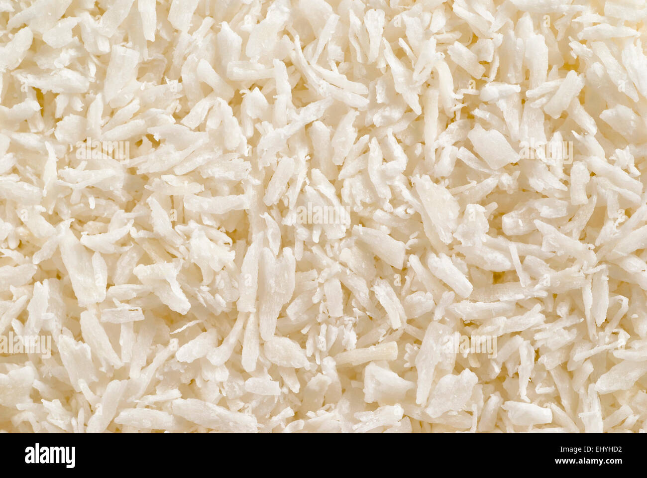 Cocos râpés plein cadre d'arrière-plan. Banque D'Images