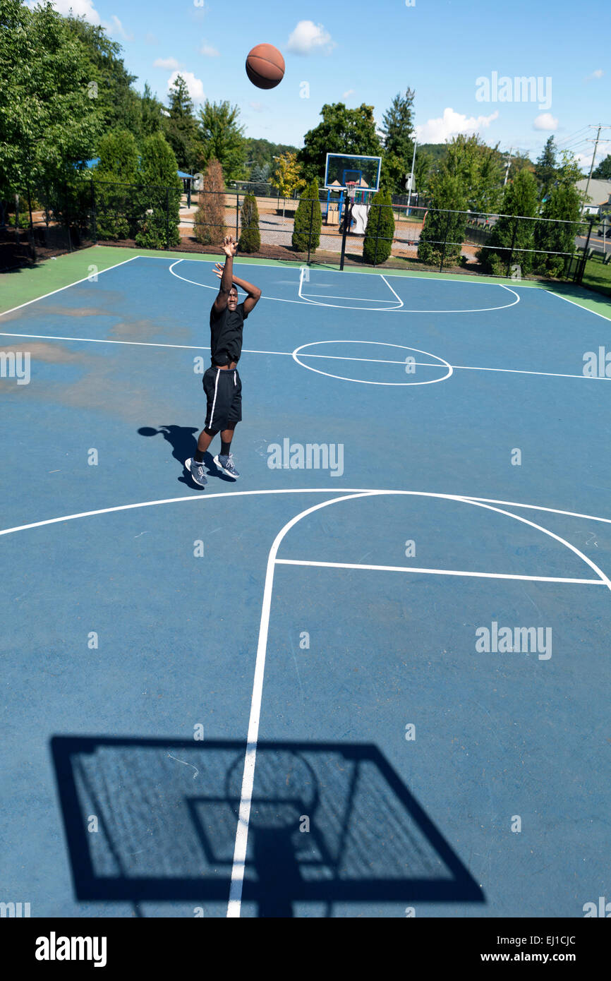 Basket-ball Shooter à trois points Banque D'Images