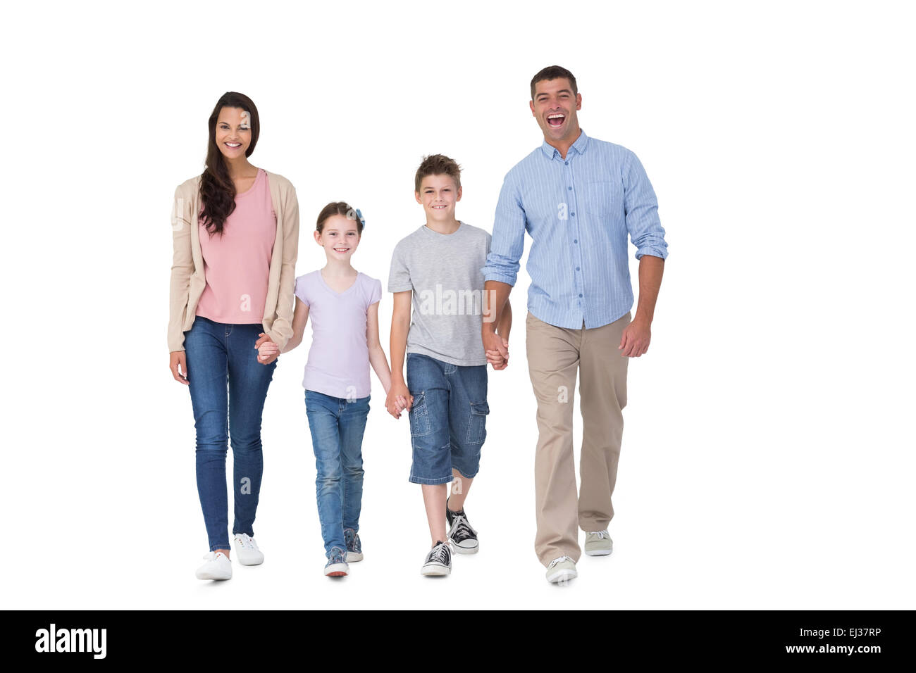 Portrait of happy family walking over white background Banque D'Images