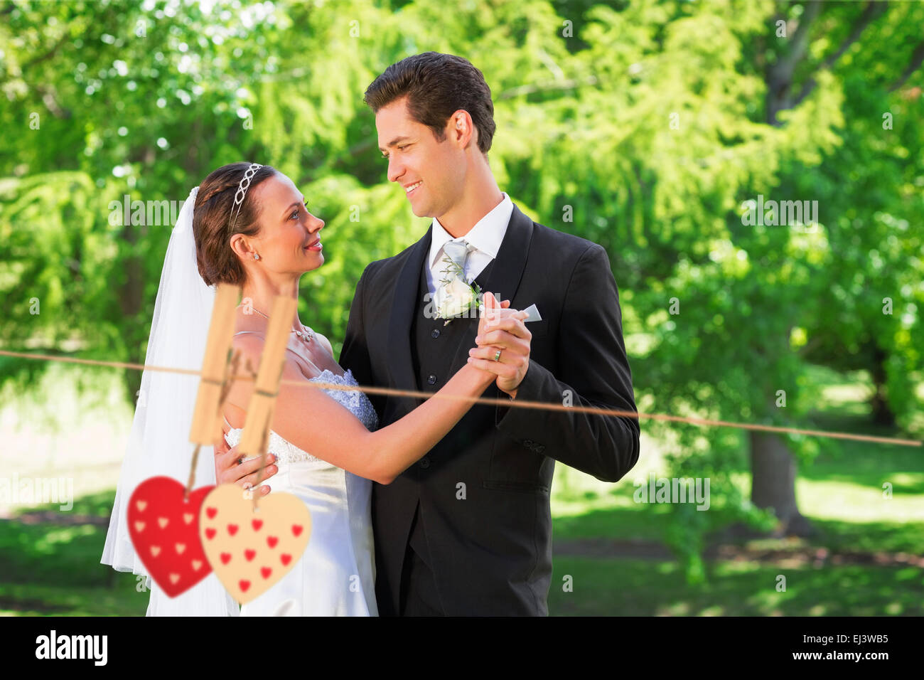 Image composite du couple dancing on jour de mariage Banque D'Images