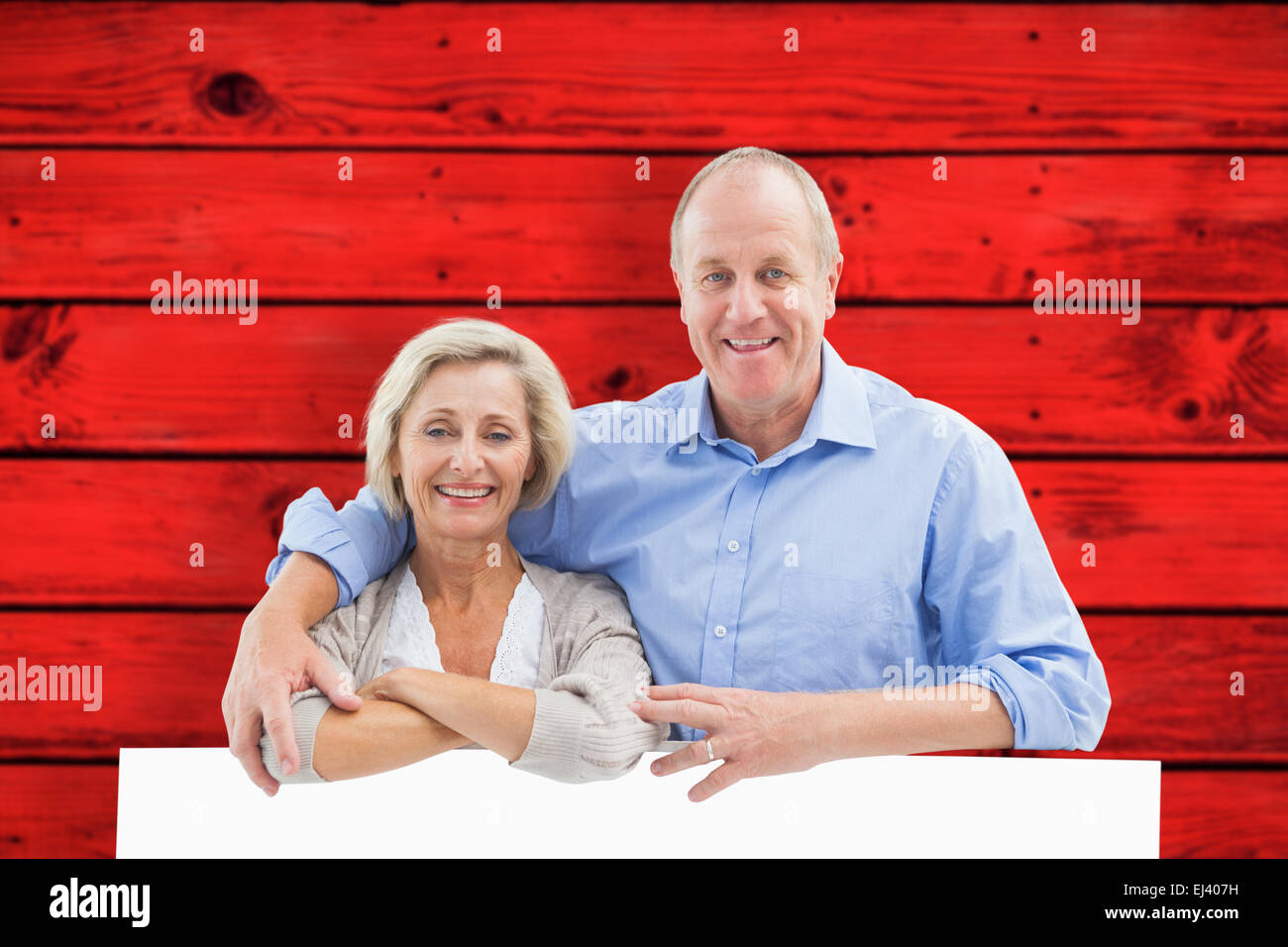 Image composite de mature couple smiling at camera Banque D'Images