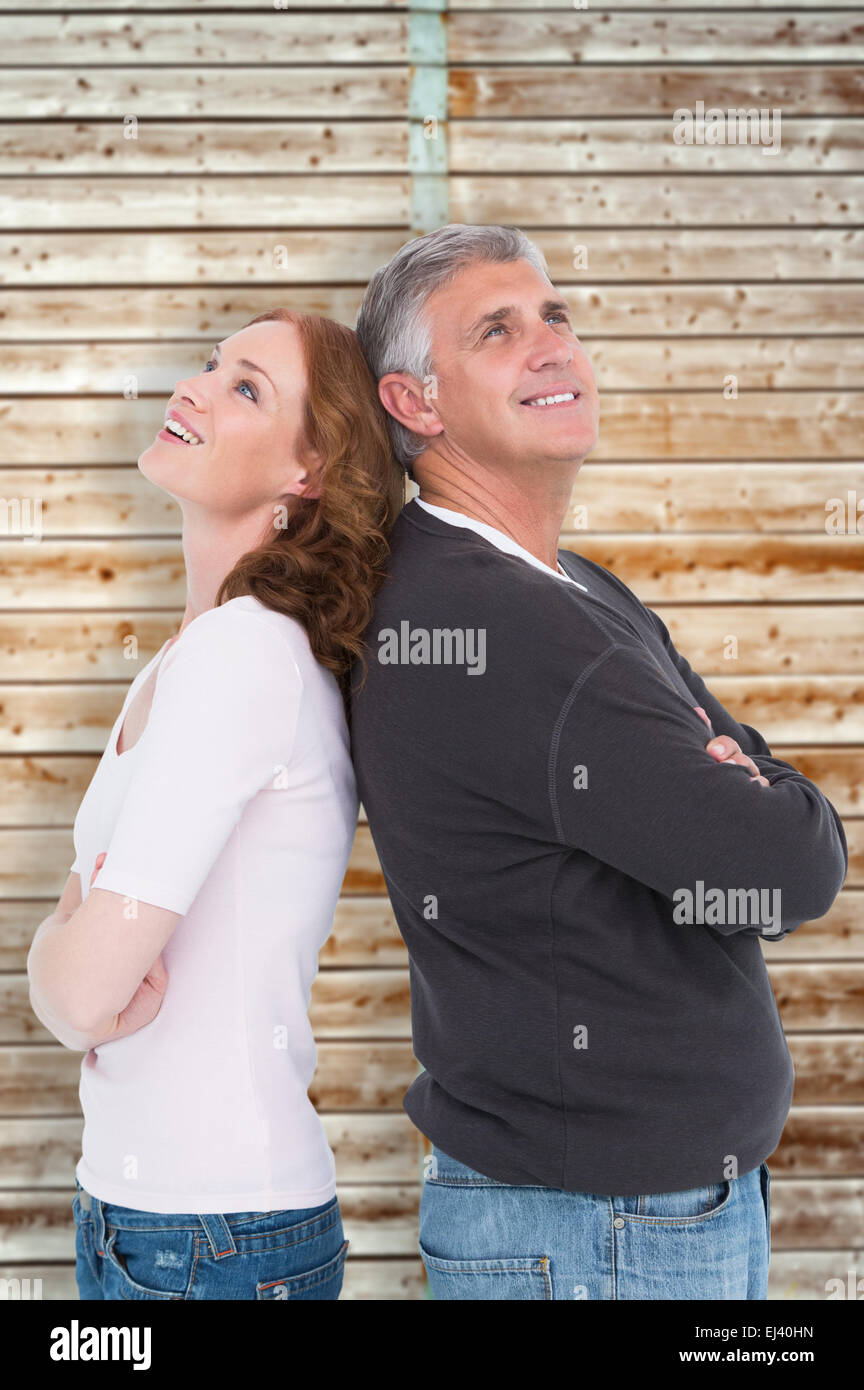 Image composite de casual couple smiling, portrait Banque D'Images
