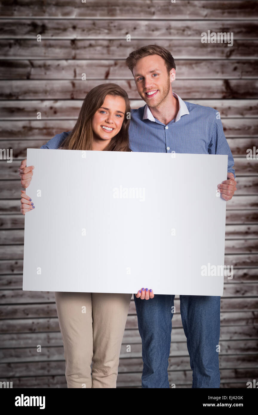 Composite image portrait de couple avec carte vierge Banque D'Images