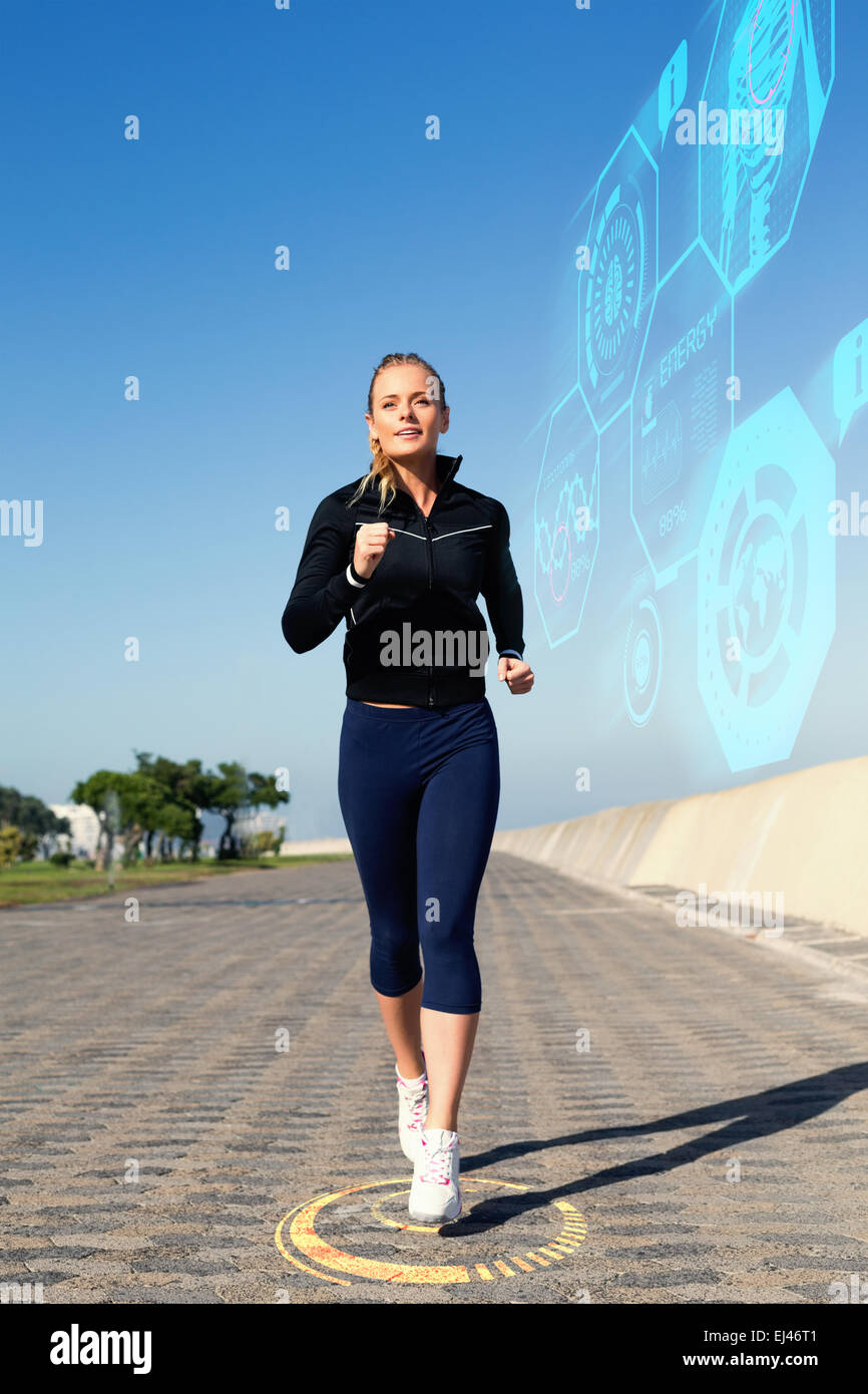 Image composite de monter sur l'embarcadère de jogging blonde Banque D'Images