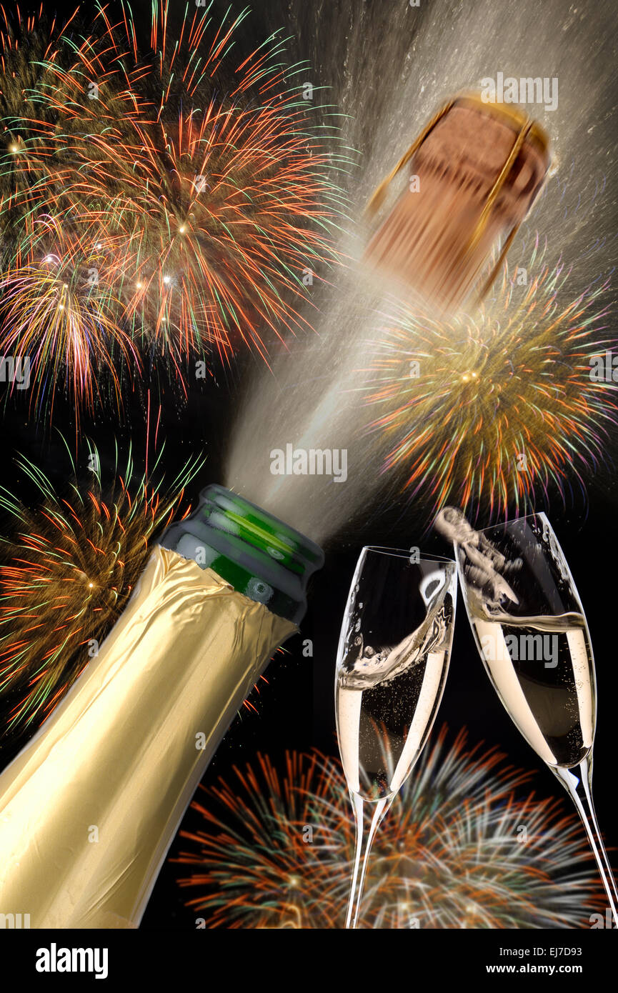 Nouvelle année et le succès avec popping champagne Banque D'Images