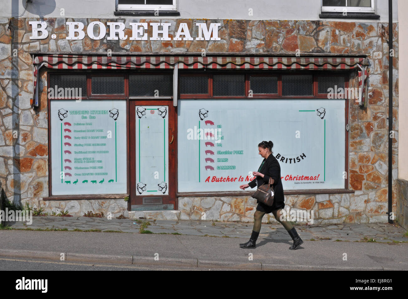 Une boutique de bouchers en Falmouth fermé. Banque D'Images