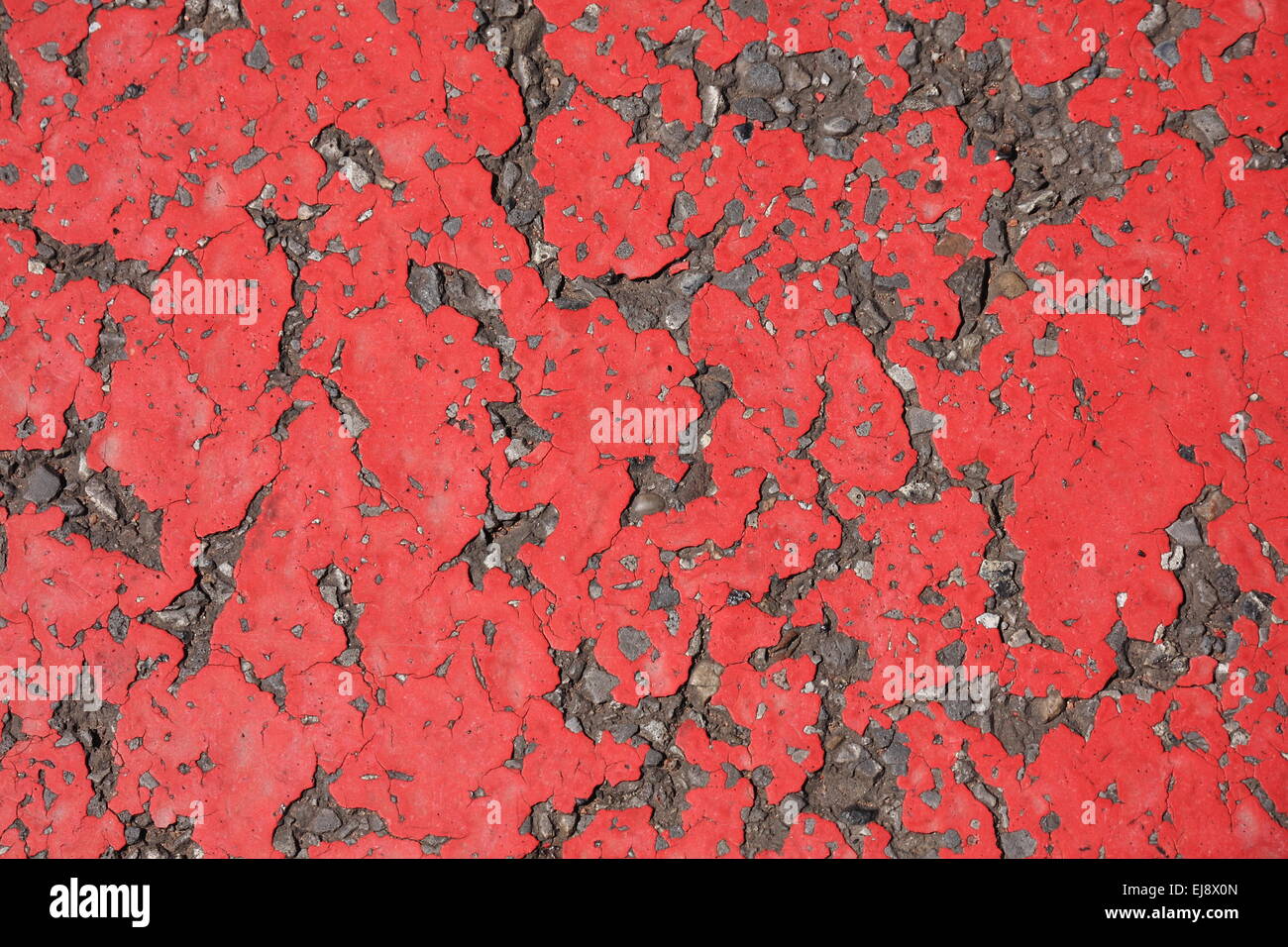 La surface de la route rouge Banque D'Images