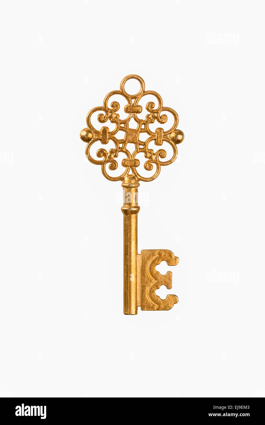Un golden key isolated Banque D'Images