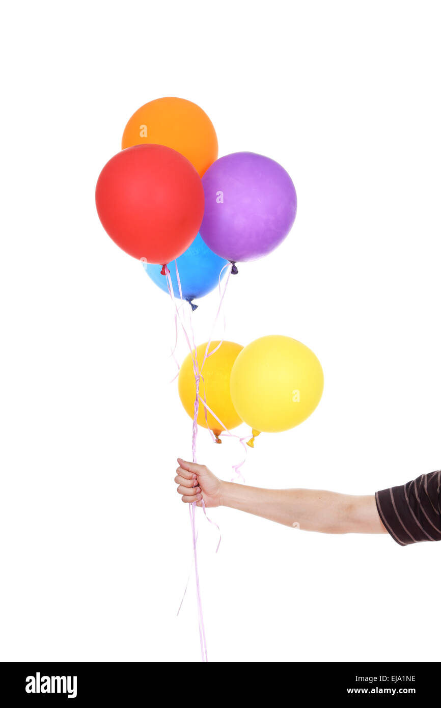 La main avec des ballons colorés isolé sur fond blanc Banque D'Images