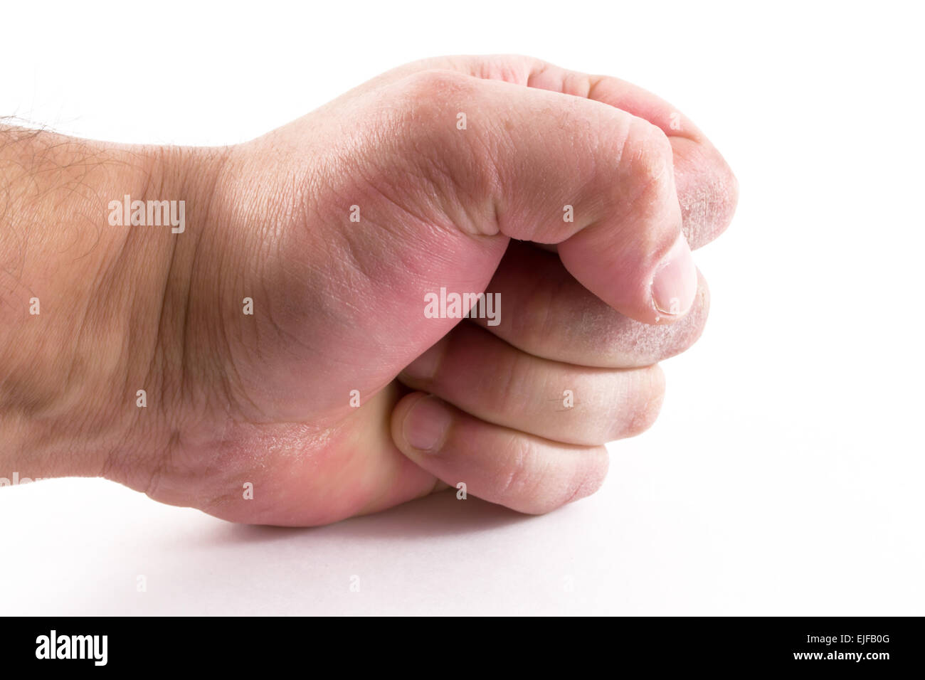 Un homme mans main avec un poing serré et la puissance Banque D'Images