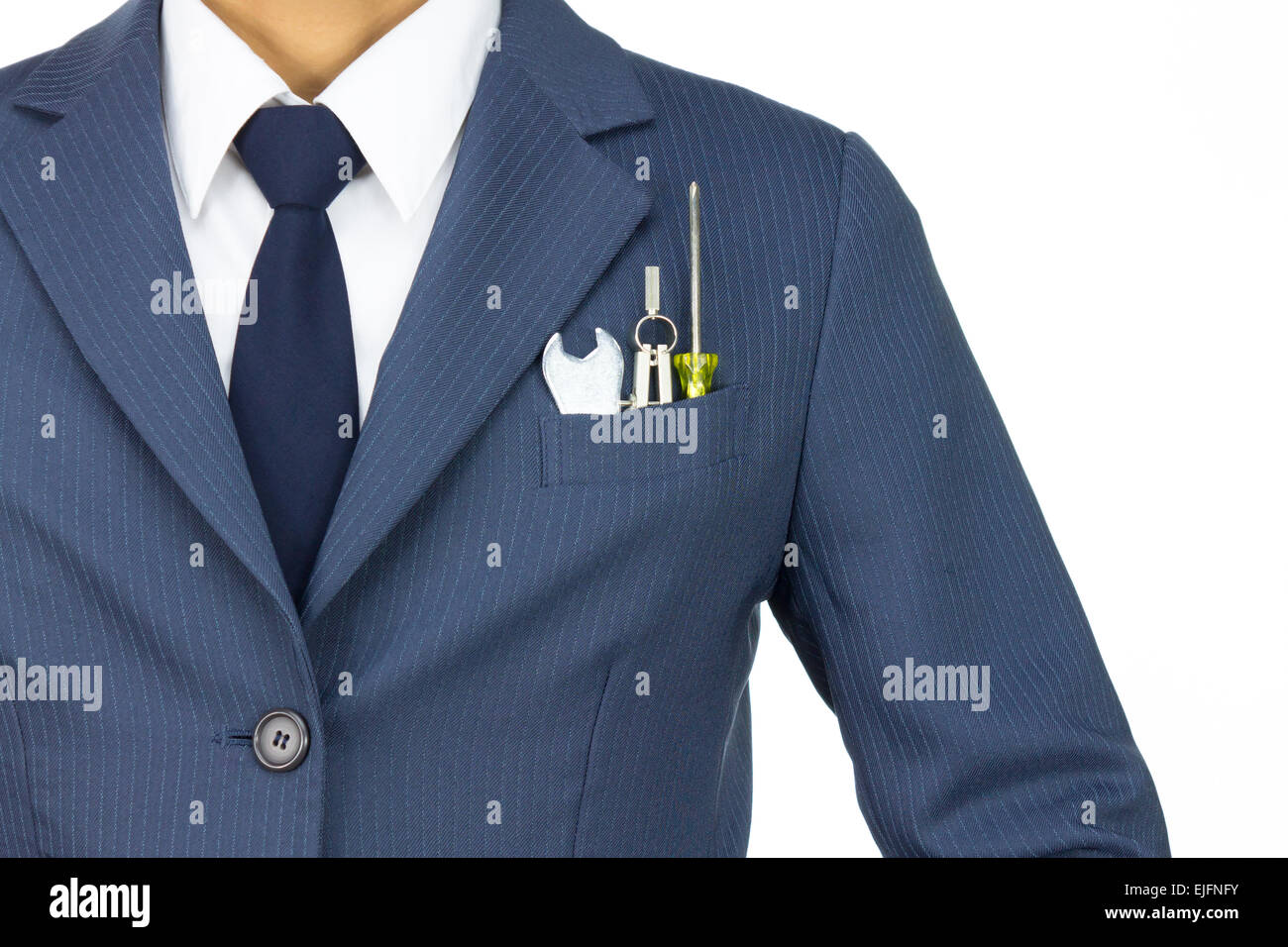 Homme d'affaires en costume bleu avec une clé et un tournevis et diviseurs dans Pocket isolated on White Concept Technique sur Banque D'Images