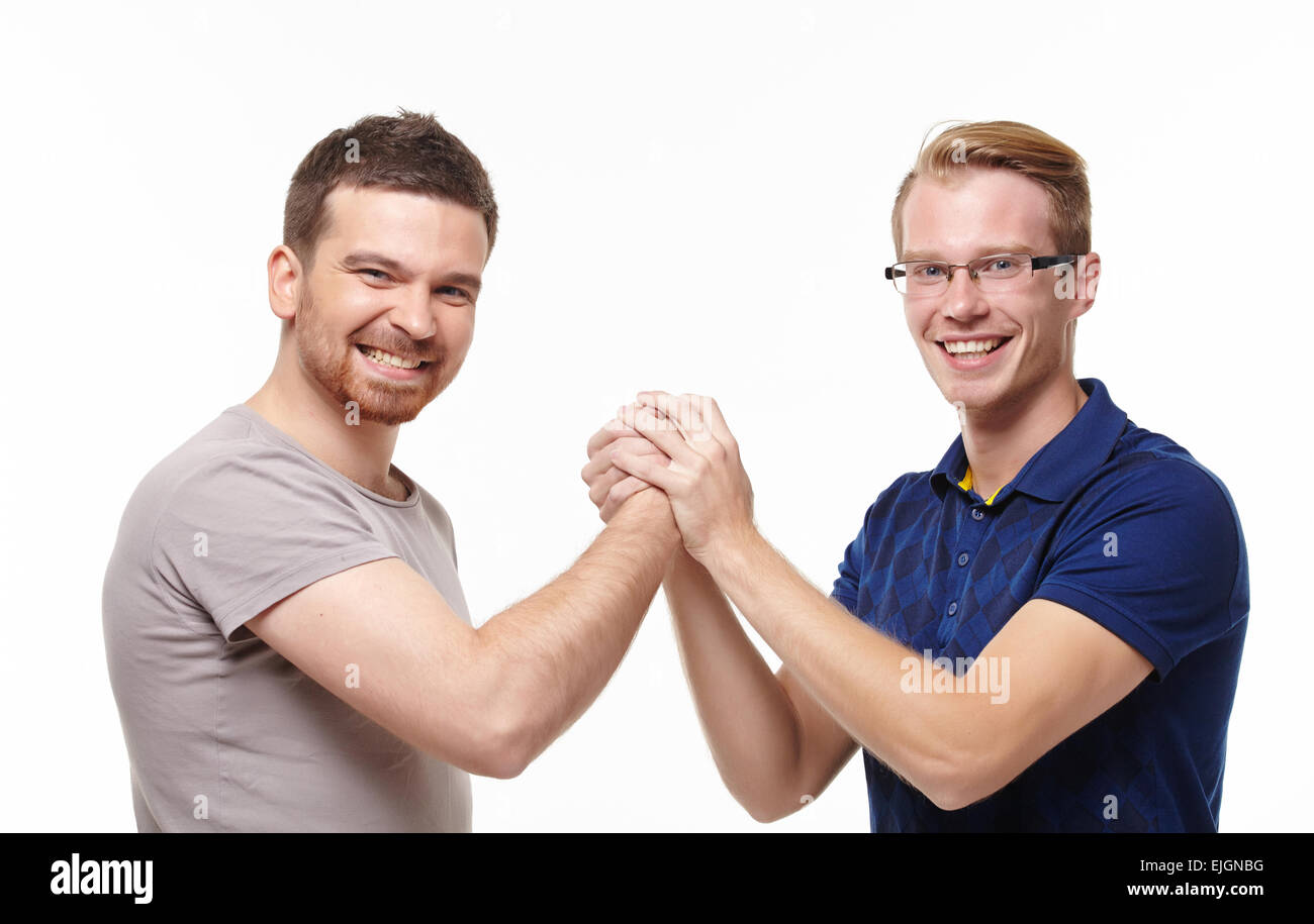 Deux jeunes hommes s'amusant à parler Banque D'Images