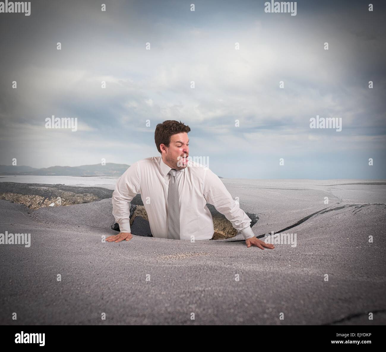 Avalé par l'asphalte Banque D'Images