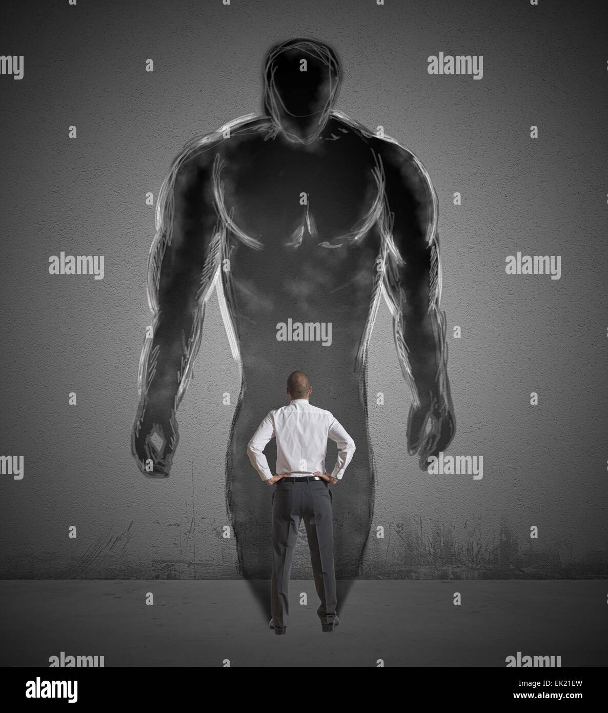 Businessman et strong shadow Banque D'Images