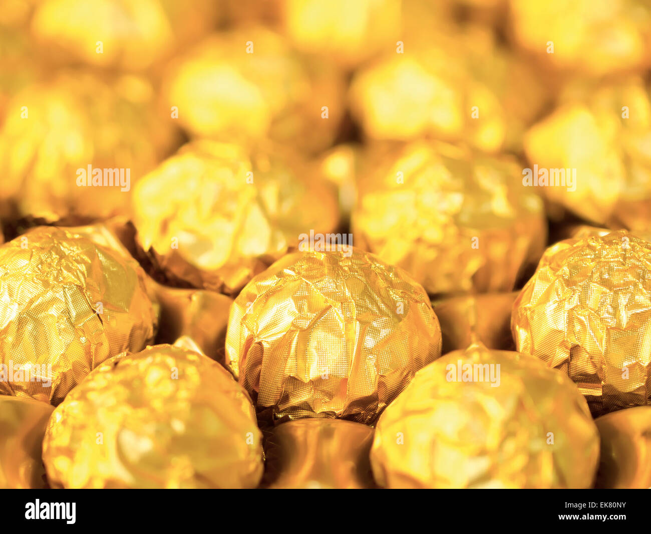 En bonbons wrappers d'or Banque D'Images