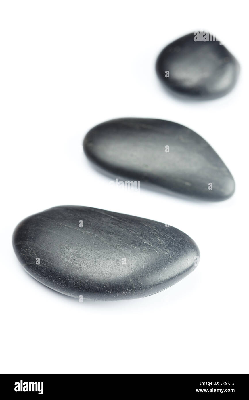 Big Black spa stones isolated on white Banque D'Images