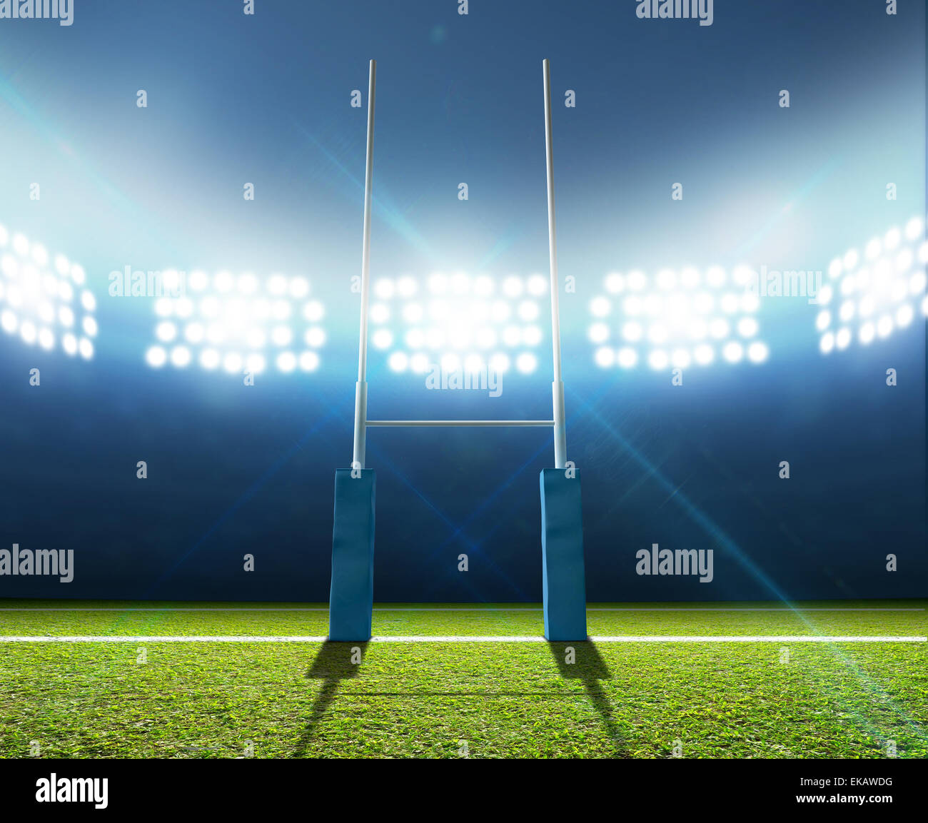 Un stade de rugby avec le rugby posts sur un terrain en gazon vert ...