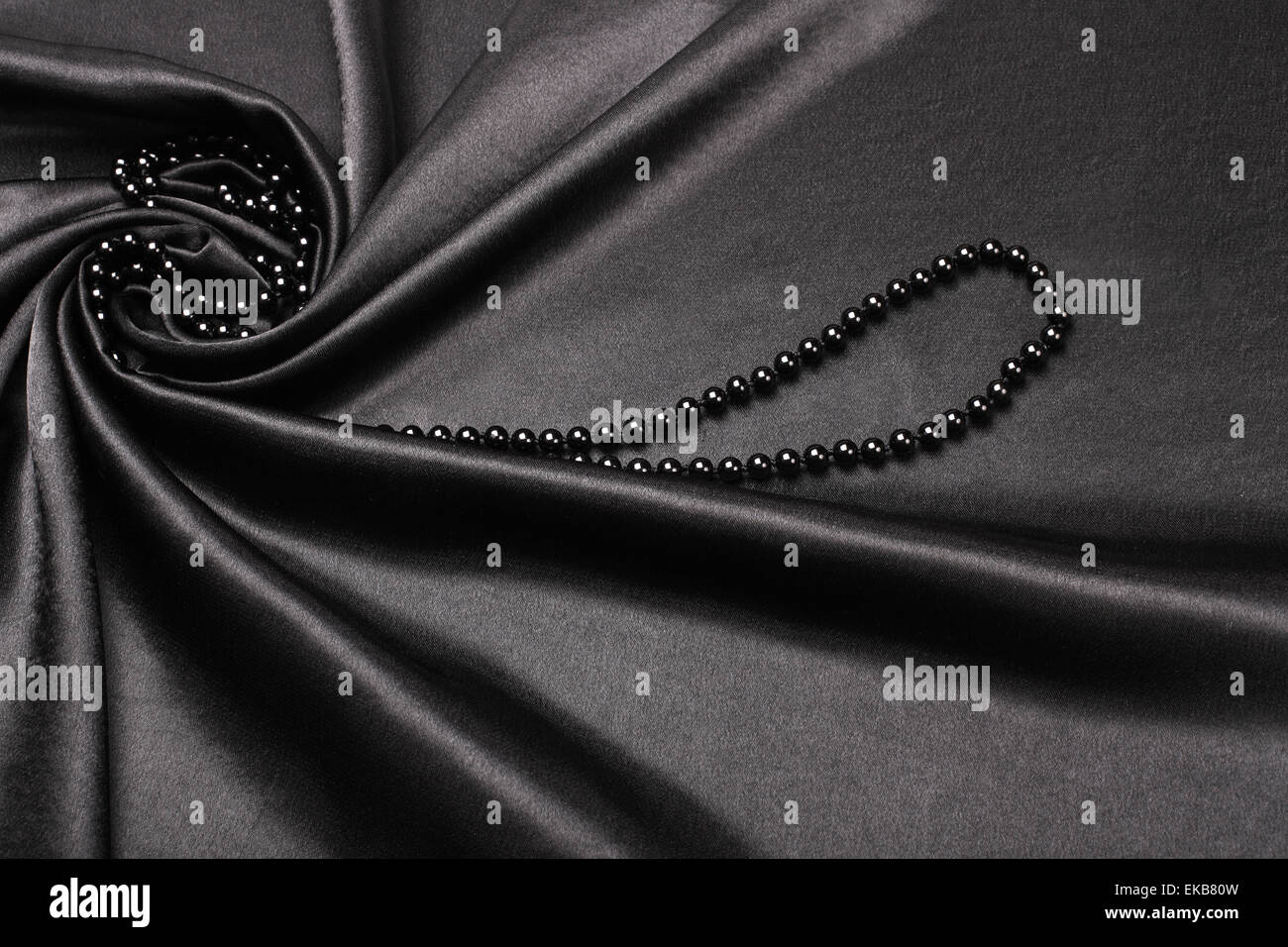 Fond tissu de soie noire Banque D'Images