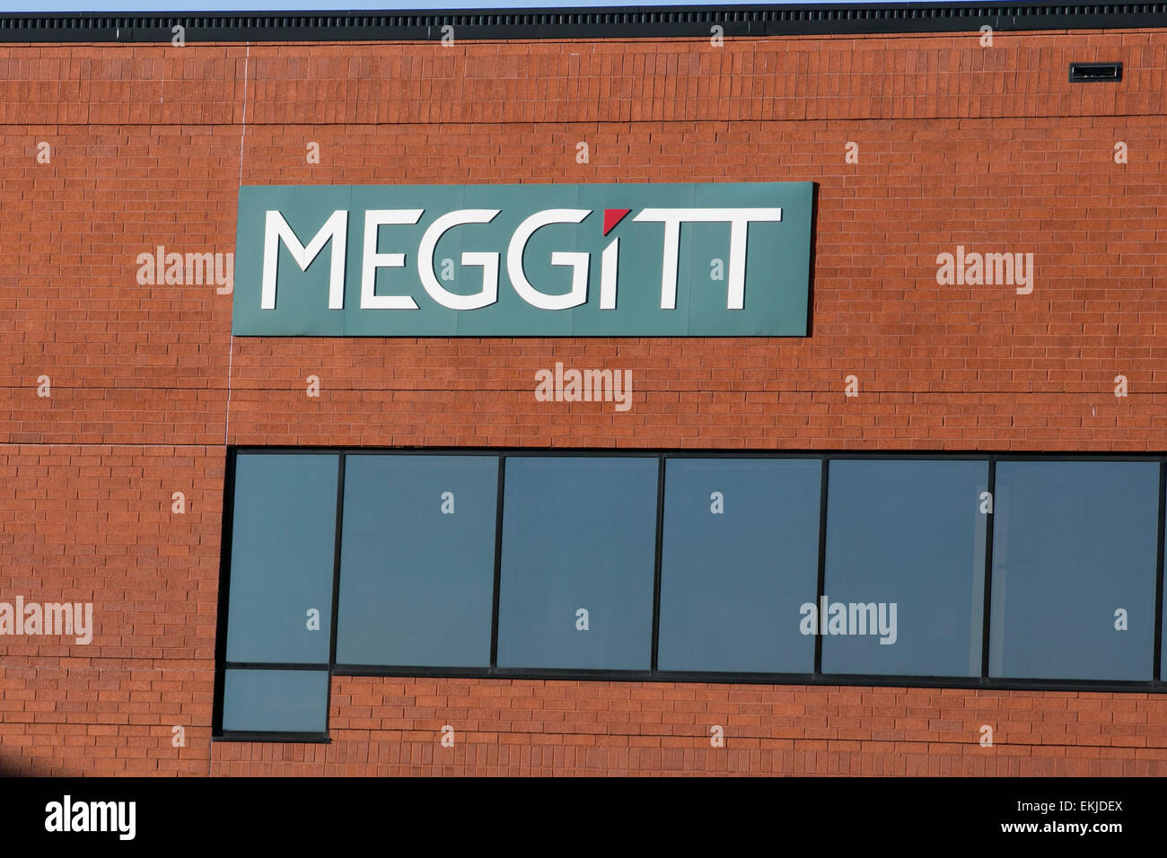 Un logo affiche à l'extérieur de l'extérieur d'un bâtiment occupé par Meggitt. Banque D'Images