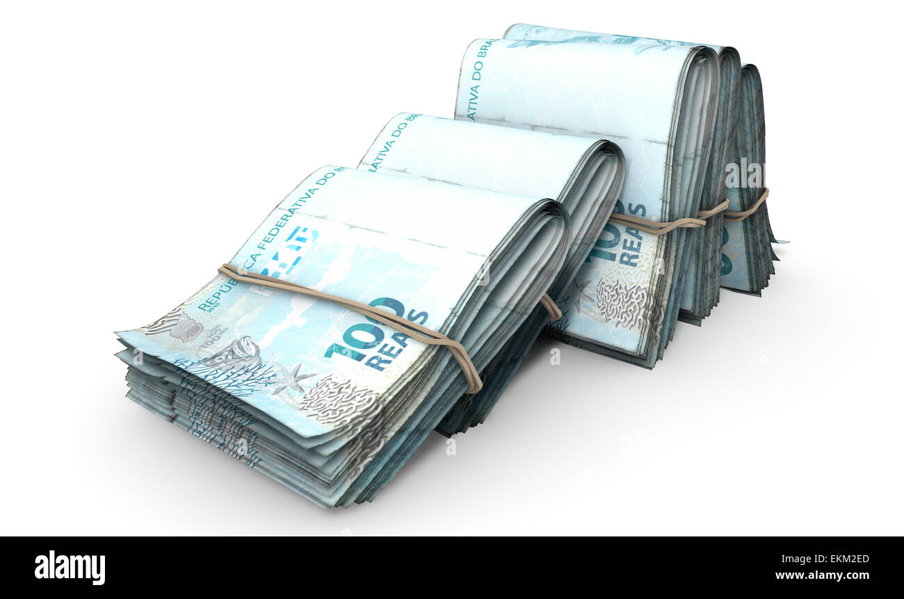 Une vue rapprochée de cinq liasses de plié sur des piles de billets real brésilien infomally tenus par un élastique énoncés dans Banque D'Images