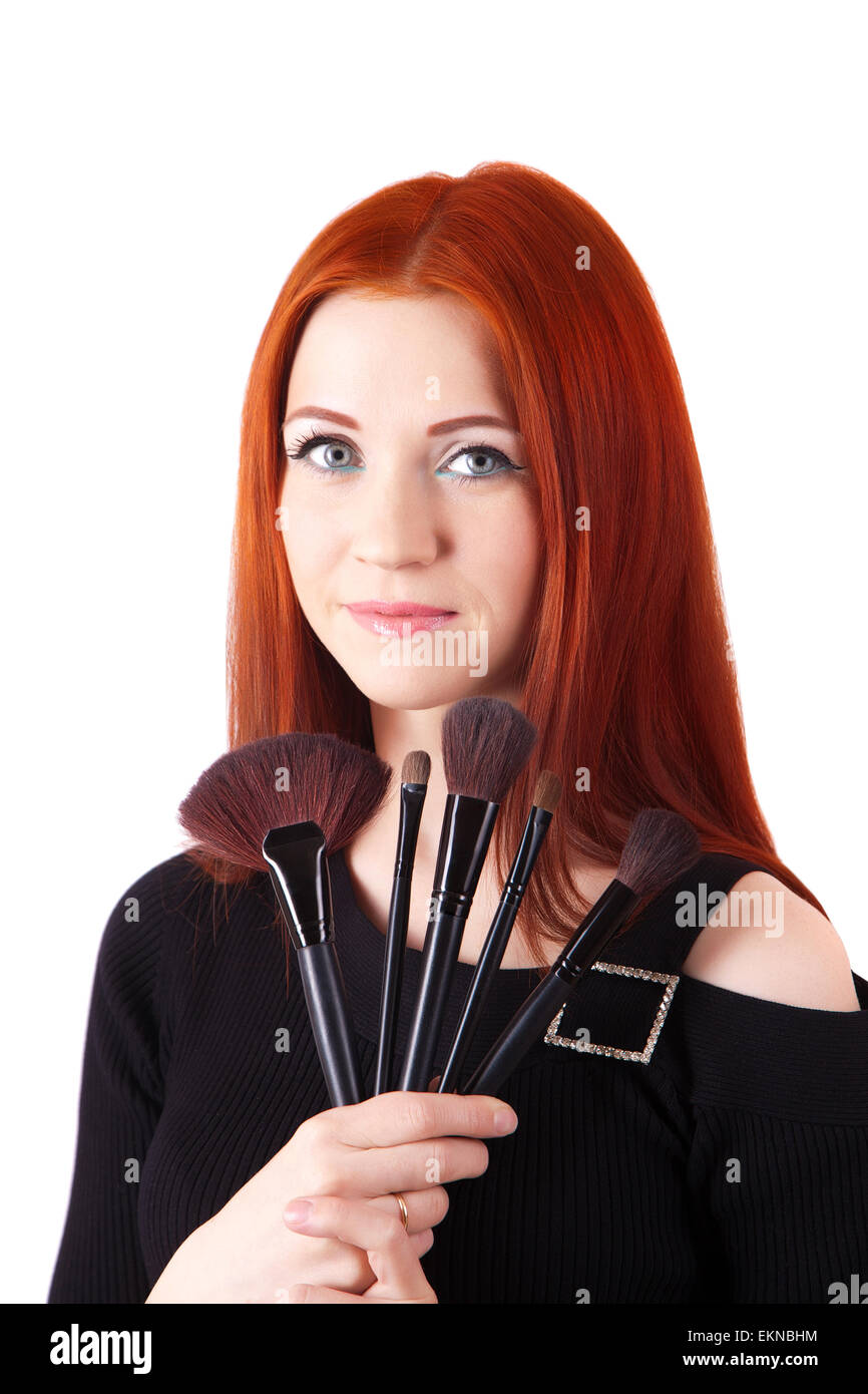 Artiste de maquillage de fille avec des pinceaux dans la main Banque D'Images