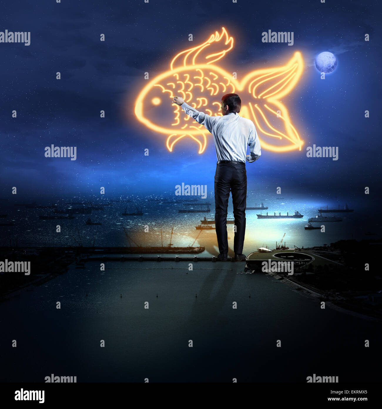 Businessman dimensions gold fish Banque D'Images